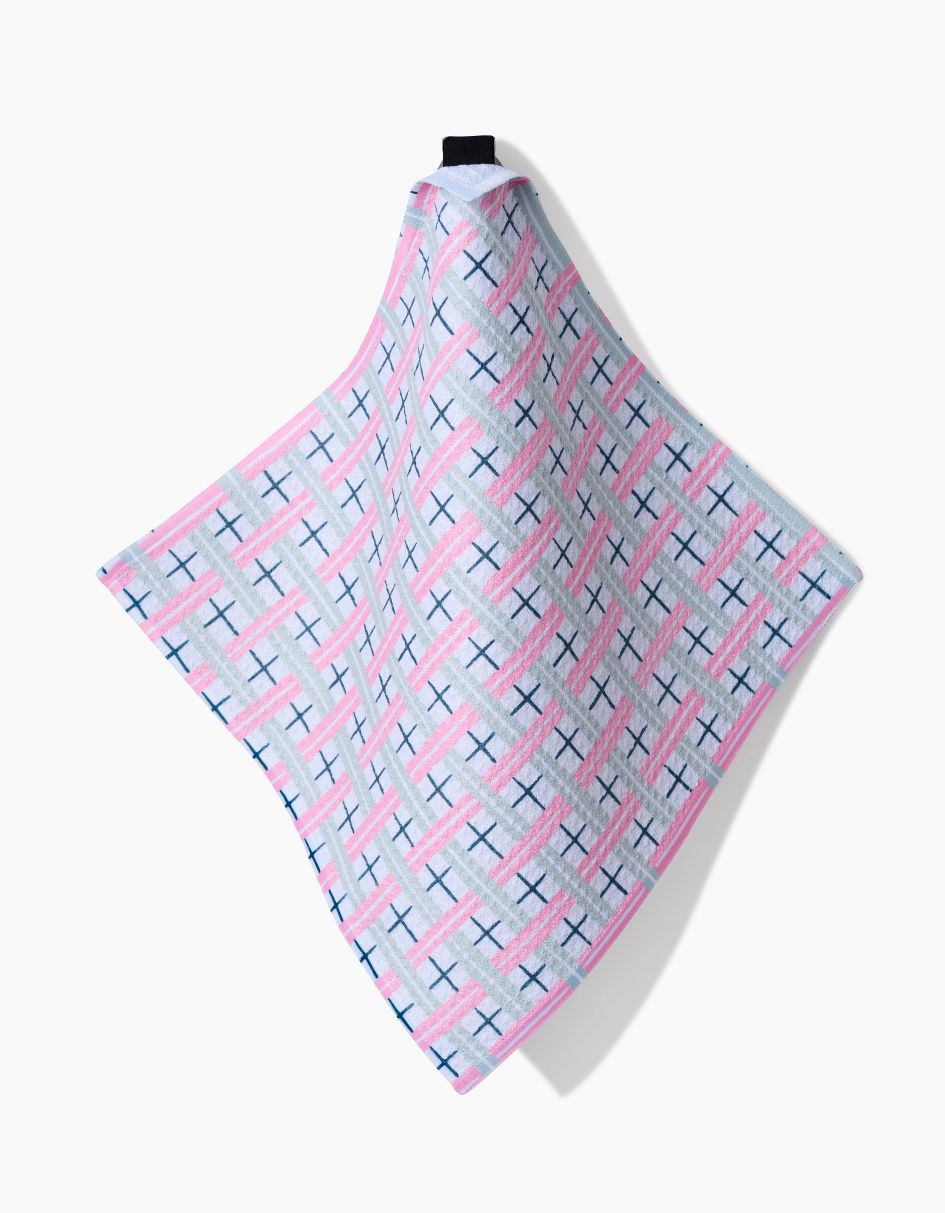 A rectangular Spring Picnic Day cloth by Hufton Studio, featuring blue and pink intersecting lines and crosses on Geoweave fabric, hangs from a black loop—part of a super-absorbent Dishcloth Set.