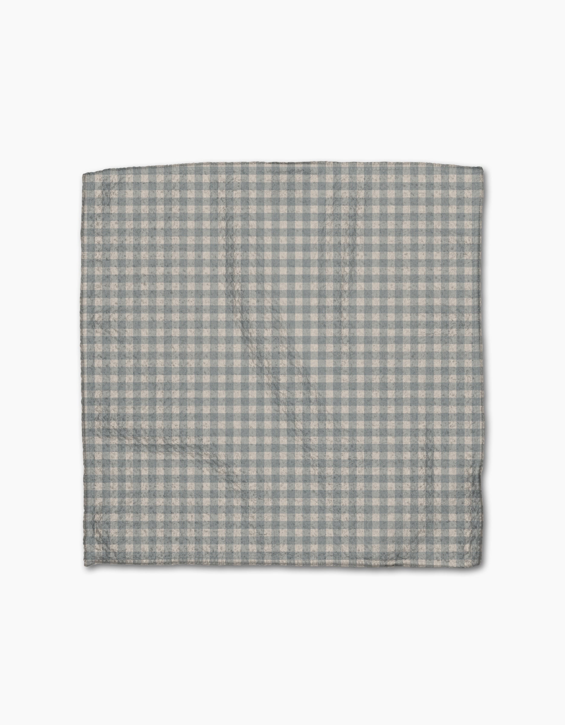 The Jenny Keller Tidepool Check is a folded cloth napkin featuring a light blue and white gingham pattern, fast-drying like a dishcloth, displayed against a plain white background.