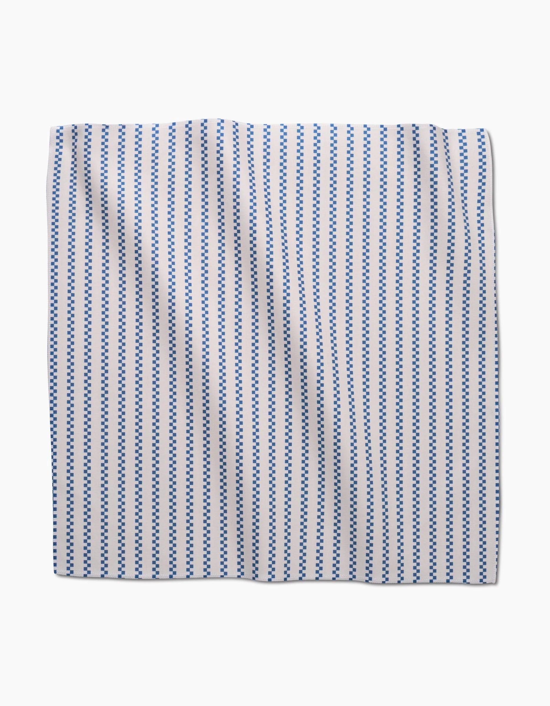 Seafaring by GEOMETRY features a rectangular Geosuede fabric with a white background and vertical rows of small blue diamonds, creating a simple geometric striped pattern. Ideal for eco-friendly dinner napkins made from recycled materials.