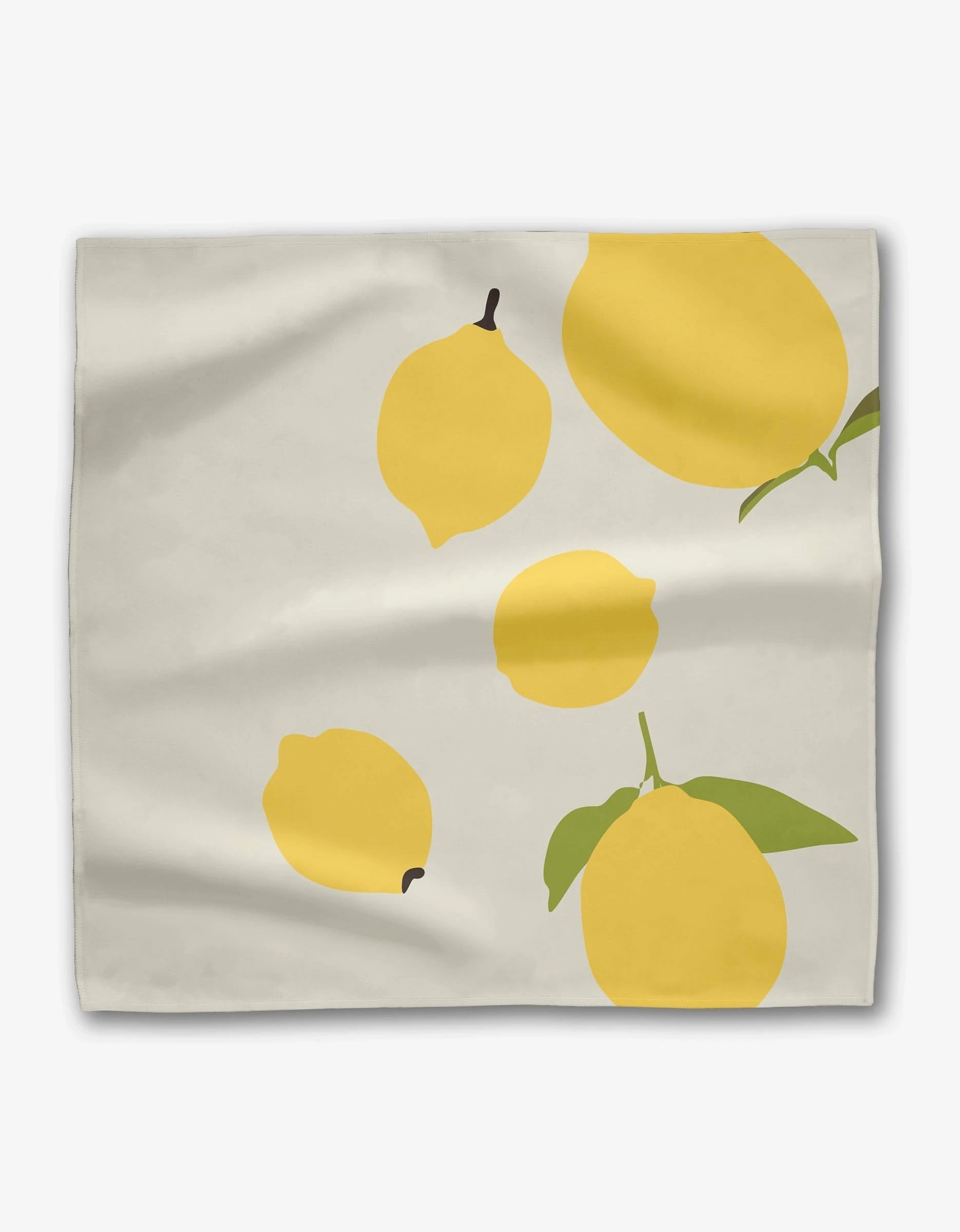The Sunny Fruit Dinner Napkin Set by GEOMETRY features a light-colored Geosuede fabric with five stylized yellow lemons and green leaves, made from recycled materials for a fresh, eco-friendly table setting.