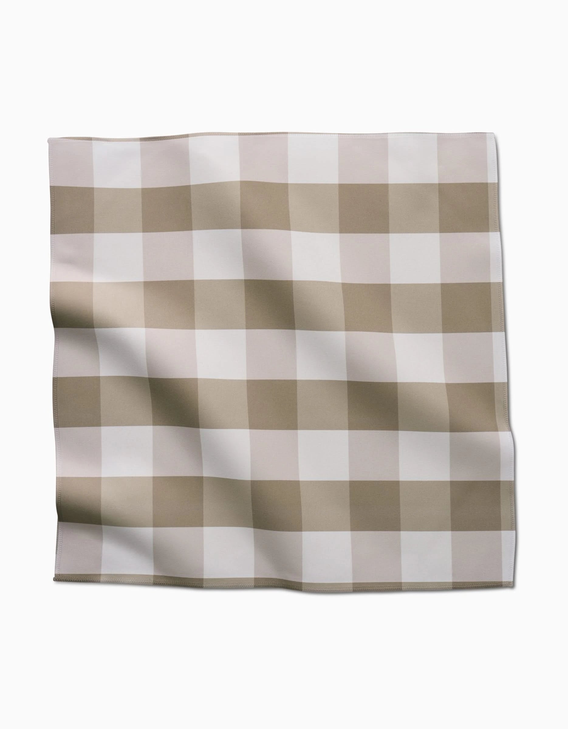 A square piece of GEOMETRYs Betty Bakes Geosuede fabric, featuring a beige and white buffalo check pattern, lies flat on a white background—ideal for an eco-friendly dinner napkin set made from recycled materials.