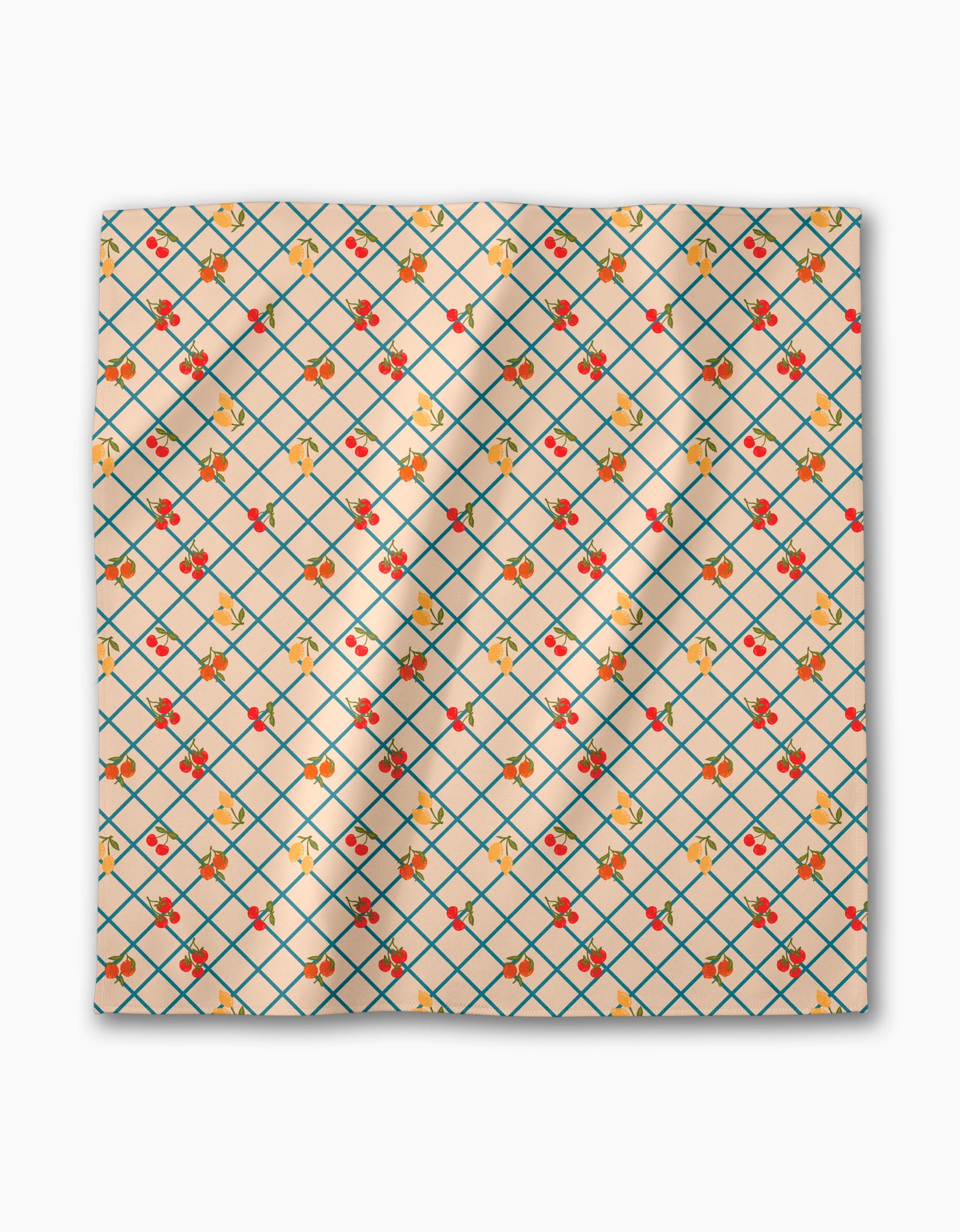 The Italian Summer Grid by Geometry is a square Geosuede fabric in light beige, featuring a blue diamond grid pattern with scattered red cherries and yellow flowers.