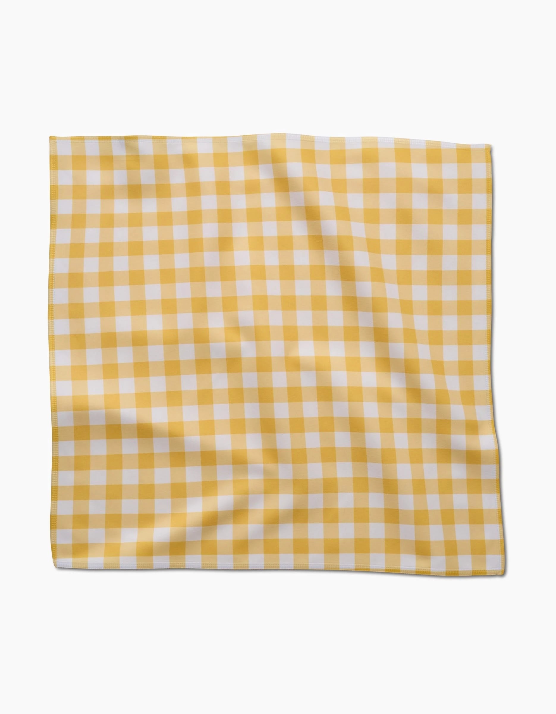 The Lemon Gingham Dinner Napkin Set by GEOMETRY, featuring a yellow and white gingham check pattern in Geosuede fabric, is shown flat against a white background with subtle folds.