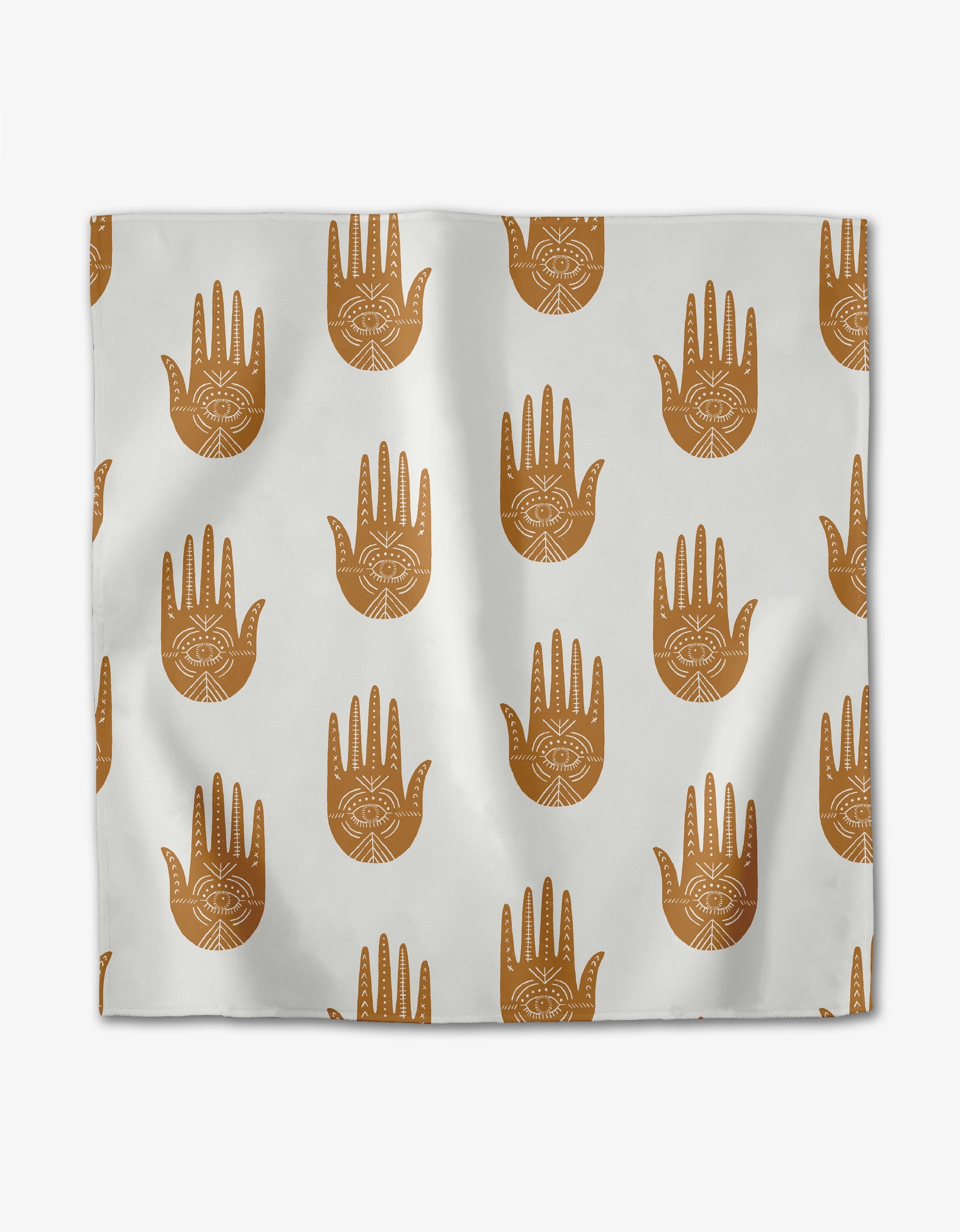 The Magical Moments Dinner Napkin Set by Jessica Swift features white fabric with evenly spaced brown Hamsa hands, each with a central eye—an eco-friendly choice for thoughtful gatherings.