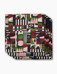 The Modern Bauhaus Mood dinner napkins by Claire Iglesias showcase a colorful geometric pattern in red, green, pink, black, and white on soft Geosuede fabric for a bold, abstract look.