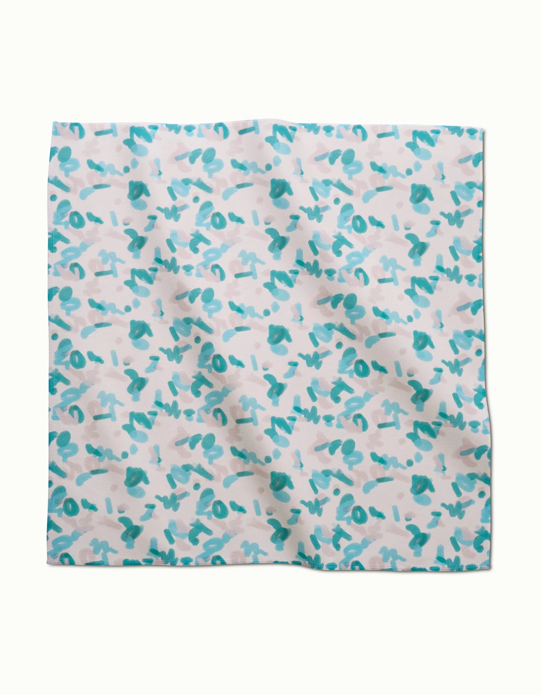 Playful Blues by GEOMETRY: a square Geosuede fabric in abstract turquoise and teal brushstrokes on white, with subtle folds—ideal as eco-friendly dinner napkins.