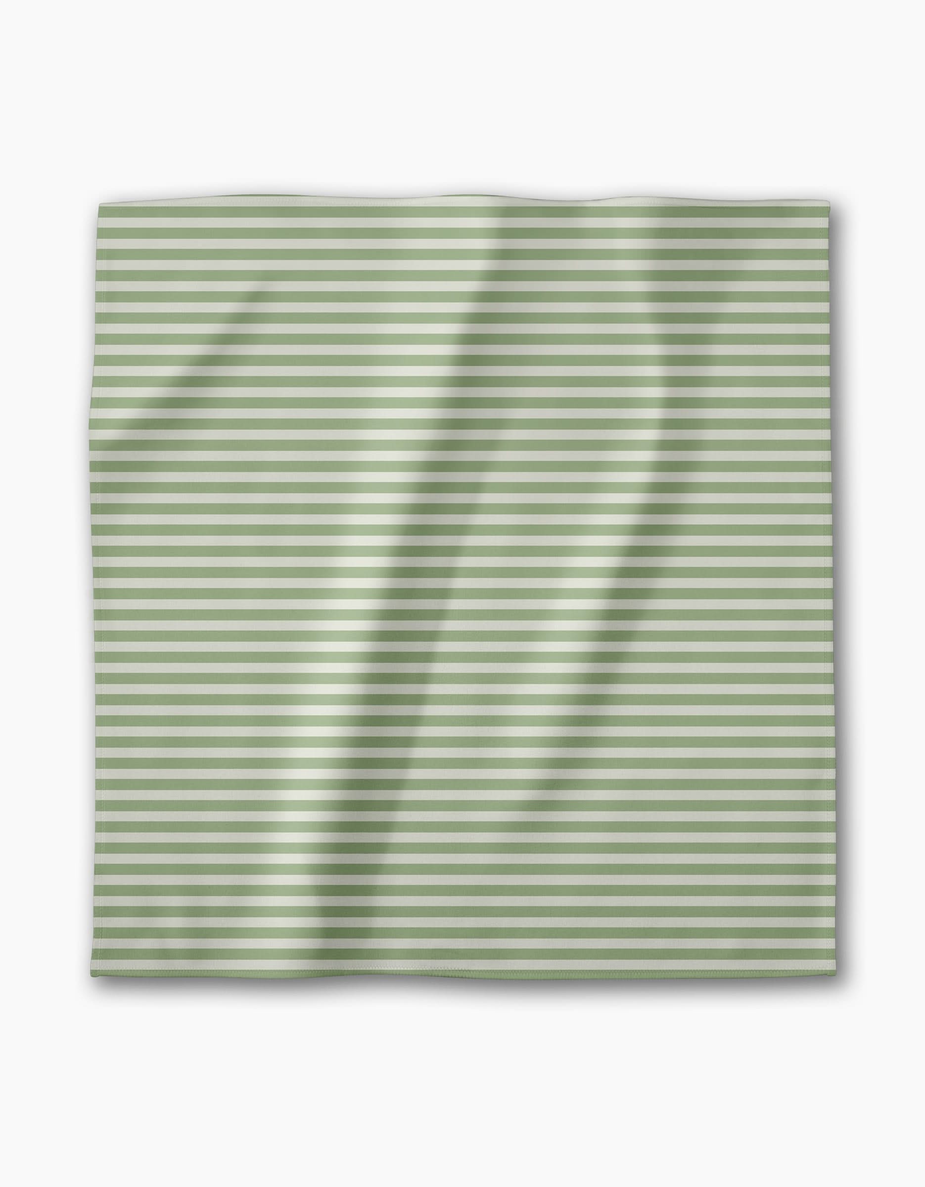 A square piece of Geometrys Seagrass Geosuede fabric with horizontal light green and white stripes, slightly wrinkled, shown on a white background.