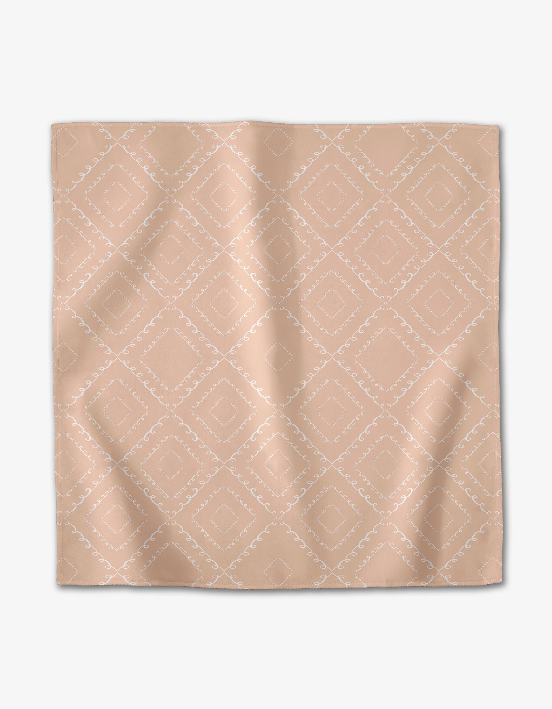 The Elena Fay Twirls napkin is a light peach-colored recycled napkin with a subtle white diamond and dotted line pattern, shown flat against a white background.