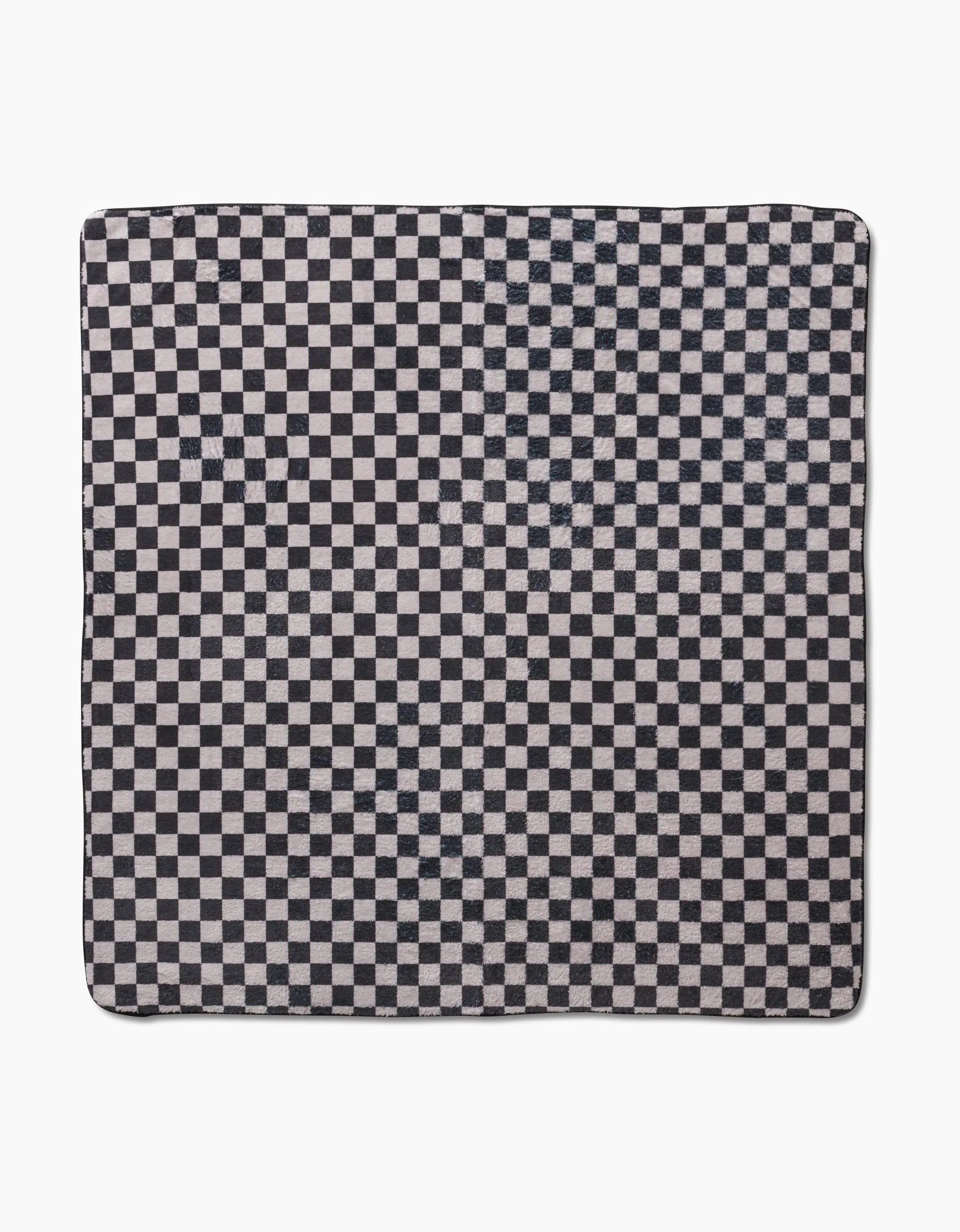 The Cool Pup by Geometry is a square cloth made from recycled materials, featuring a black and white checkered pattern with evenly spaced small squares, displayed flat on a white background.