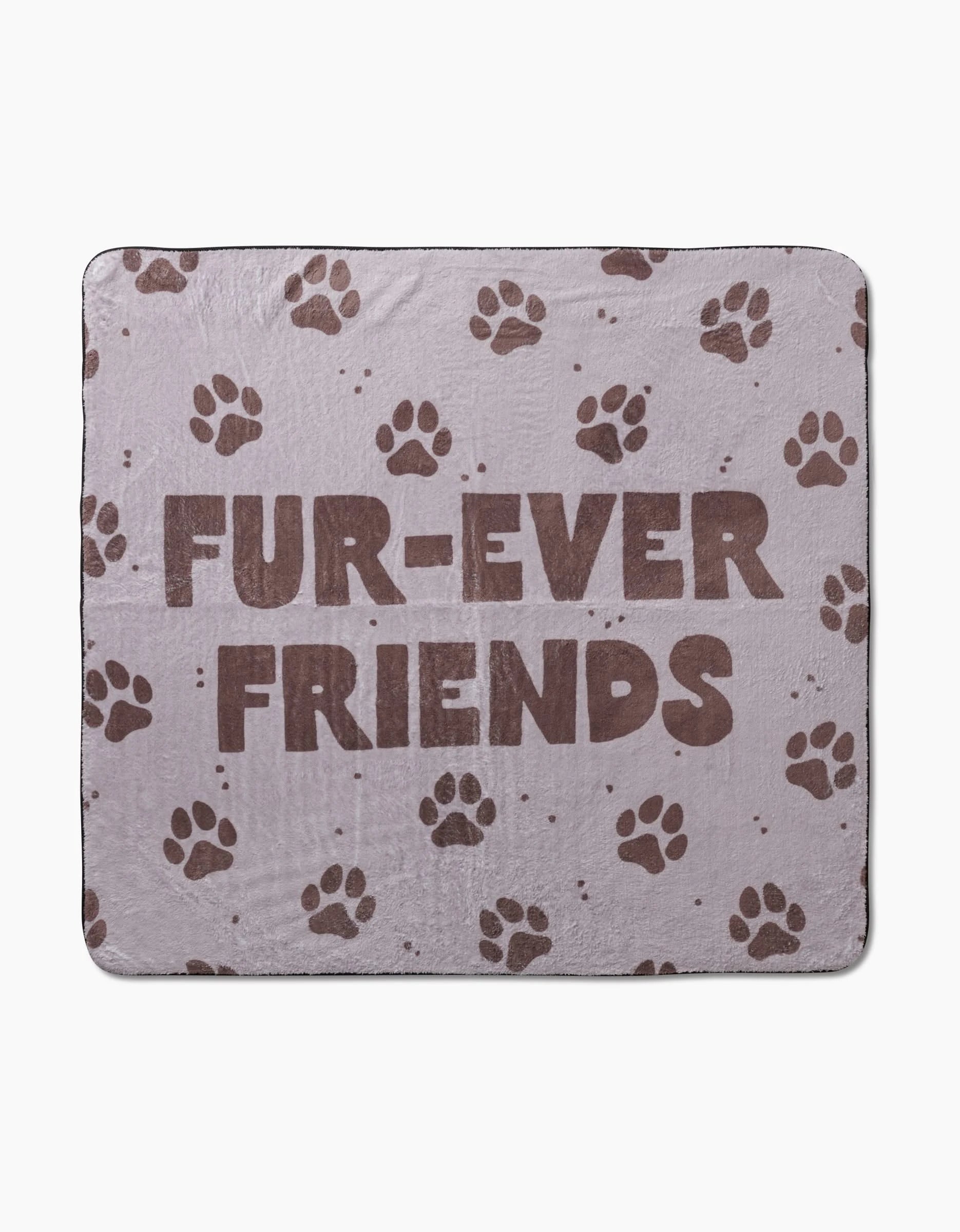 The Geometry Fur Ever Friends Plush Dog Towel is light brown with dark brown paw prints and FUR-EVER FRIENDS in bold. Made from ultra-absorbent recycled materials, it offers comfort and sustainability.