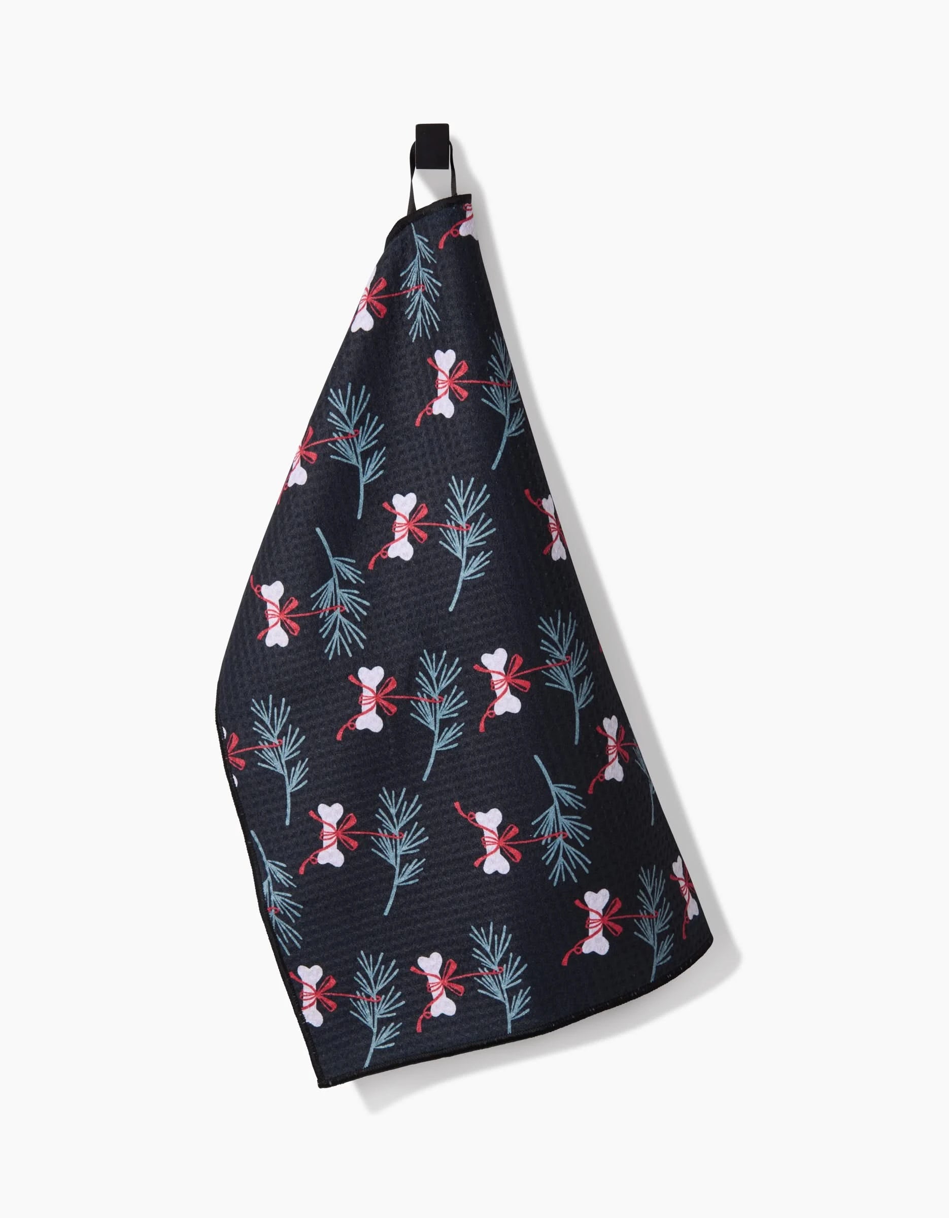 The Bones For Christmas Paw Towel by Charlie Rowan Designs features red and white candy canes with green pine branches—an ultra-absorbent, festive dog towel perfect for the holidays.