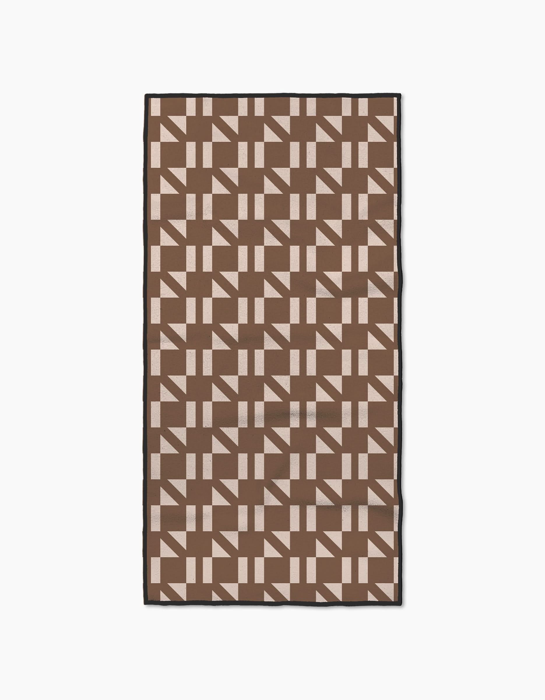 The Geometry Affogato Fitness Towel is rectangular and ultra-absorbent, featuring a tan and brown geometric grid pattern with a black border.