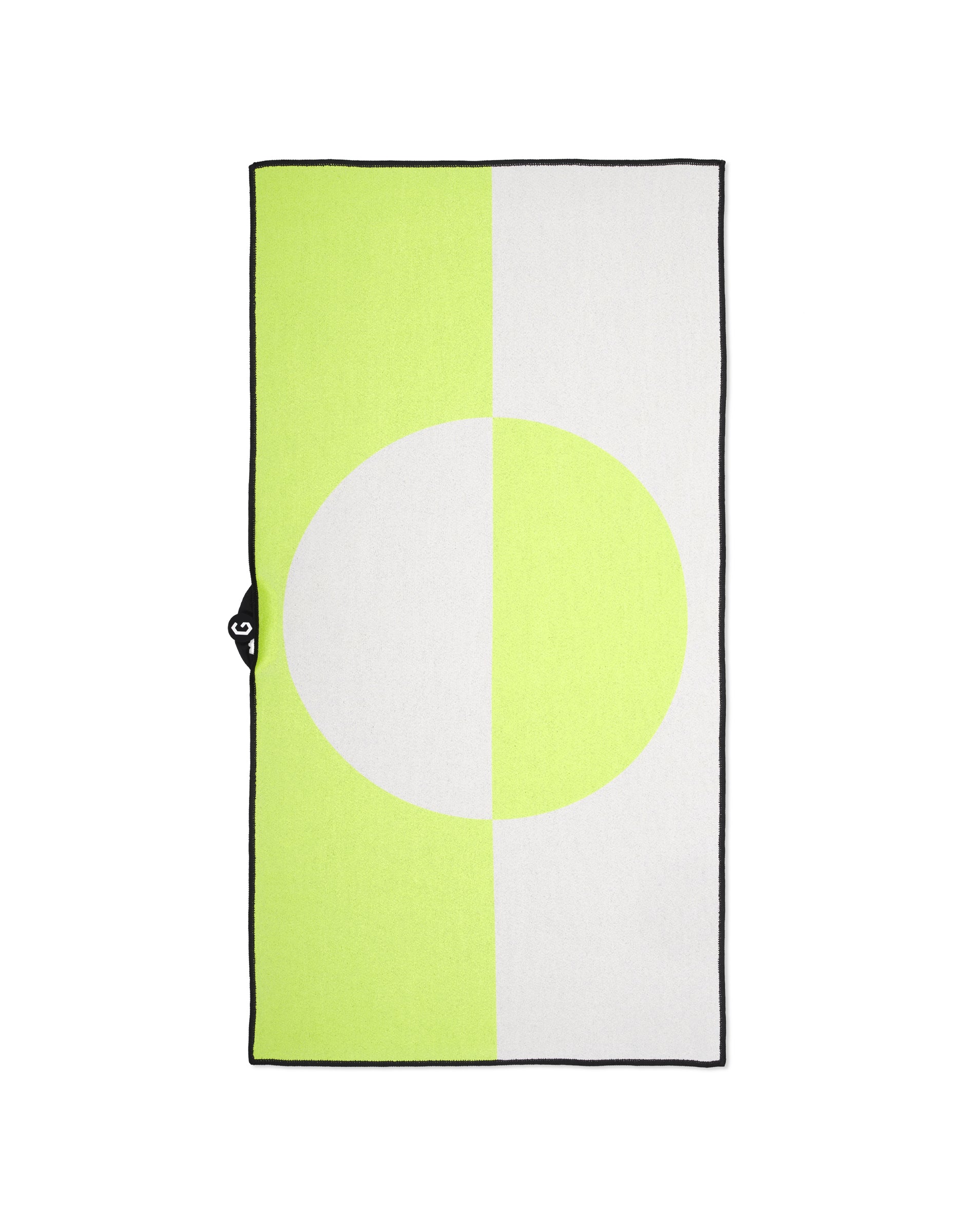 The Magna - Modern Edge by GEOMETRY is a rectangular fitness towel with a half light yellow-green, half white geometric design and a central two-tone circle. Made from ultra-absorbent recycled materials, it features black edging and a small black tab.