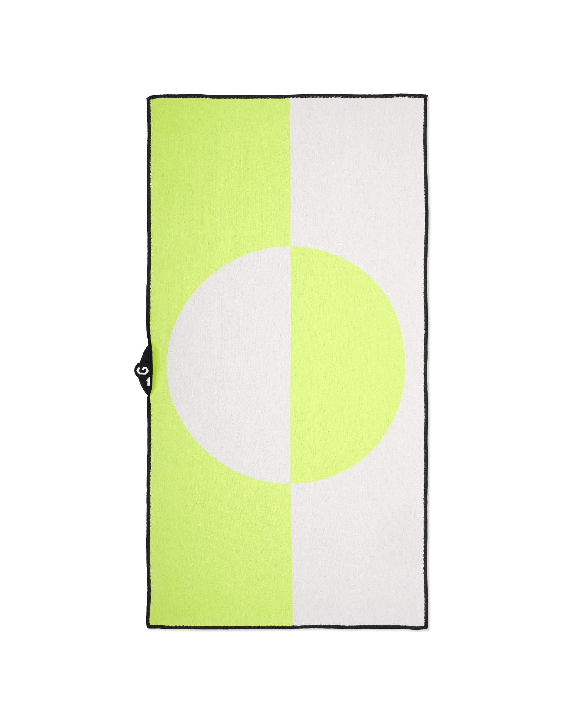The Magna - Modern Edge by GEOMETRY is a rectangular fitness towel with a half light yellow-green, half white geometric design and a central two-tone circle. Made from ultra-absorbent recycled materials, it features black edging and a small black tab.