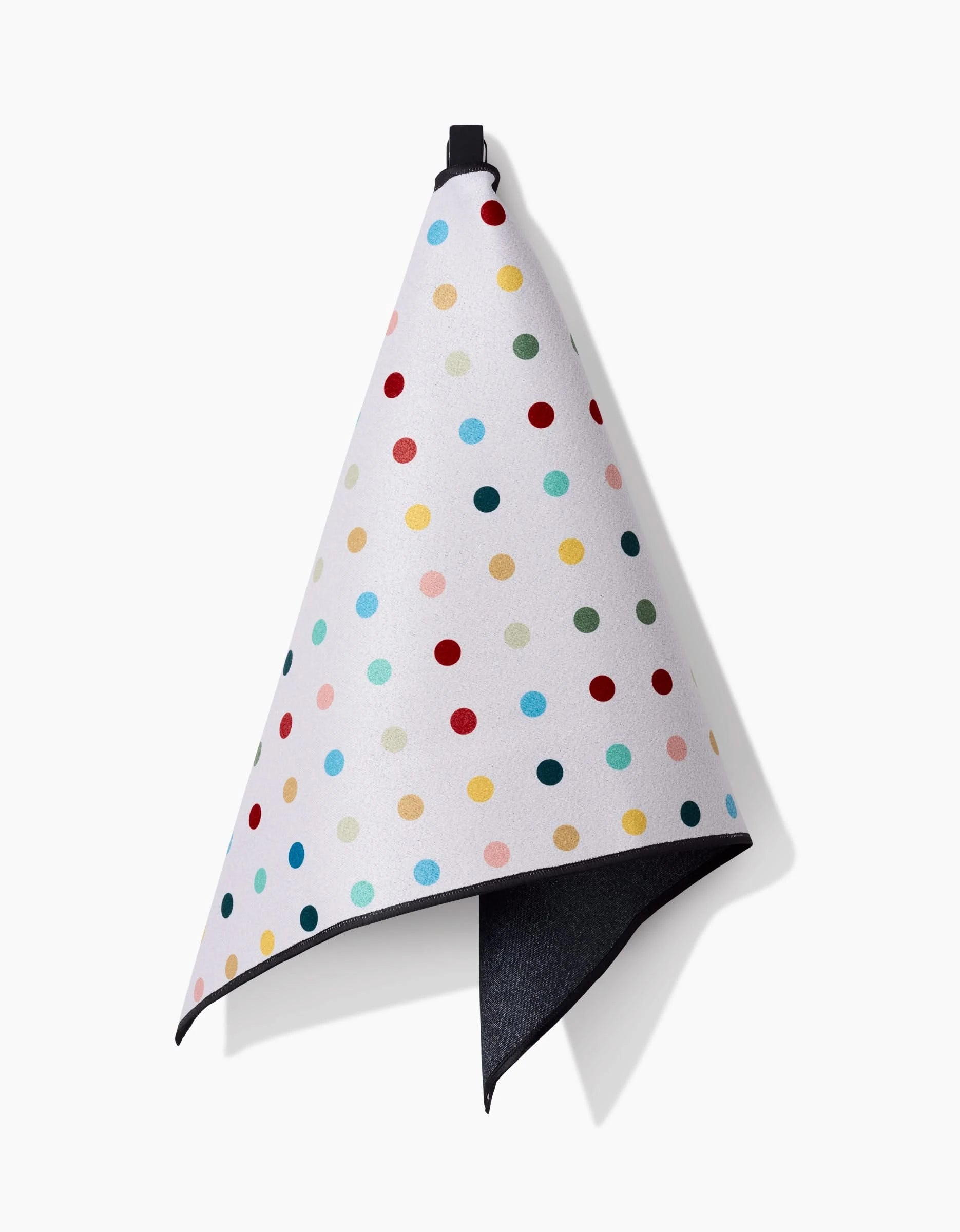The Elizabeth Edwards Retro Dot Fitness Towel features multicolored polka dots on white, a black hanging loop, and a dark gray underside. Made from recycled materials, the towel is shown against a plain white background.