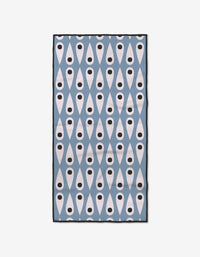 Introducing Retro Rain by Anette Heiberg: a rectangular, ultra-absorbent fitness towel with a blue background and repeating white teardrop shapes with black dots in a geometric pattern.