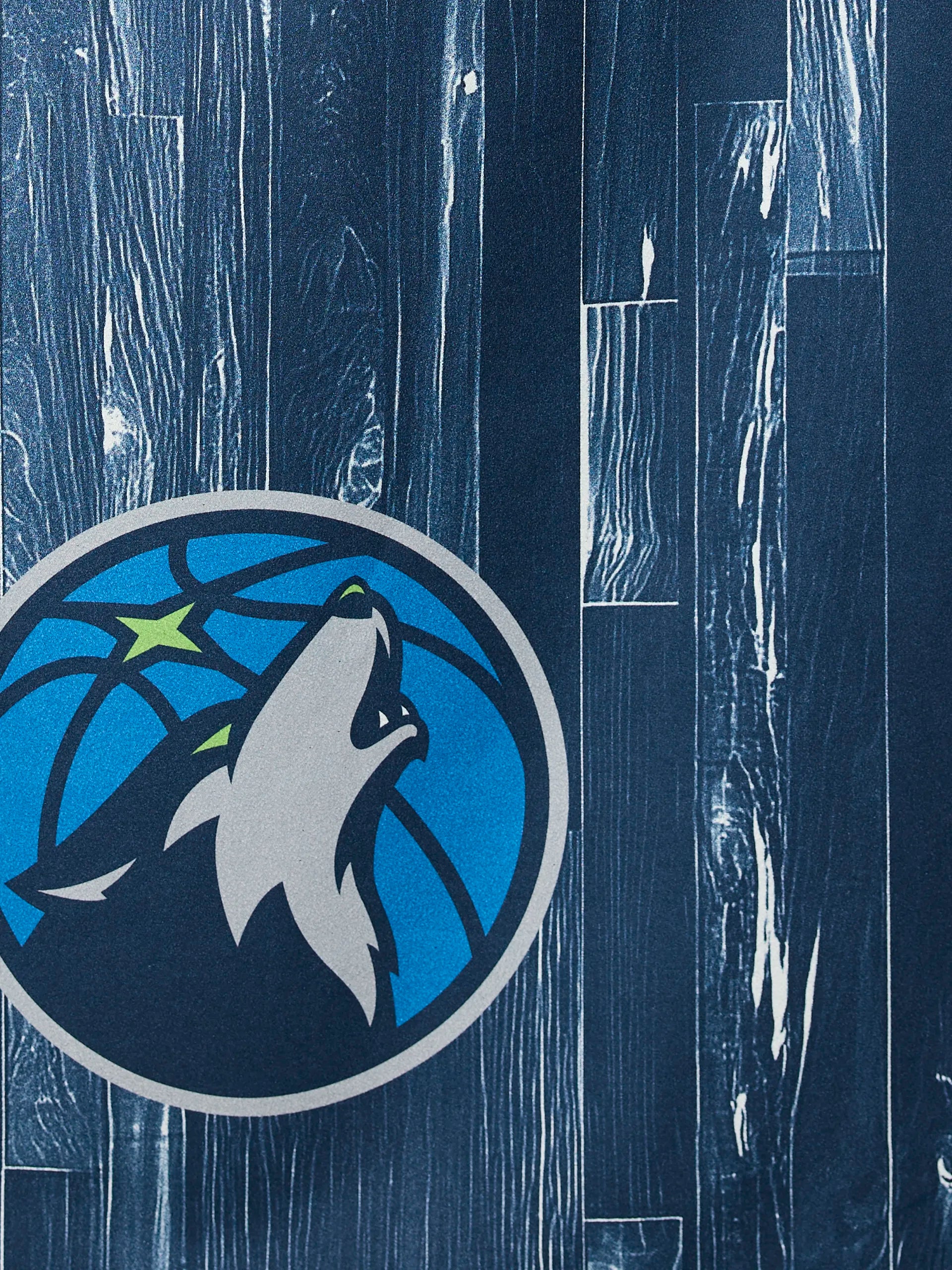 The Timberwolves Zone by Geometry features the Minnesota Timberwolves logo on a stylized basketball court with dark and light blue wood panel patterns.