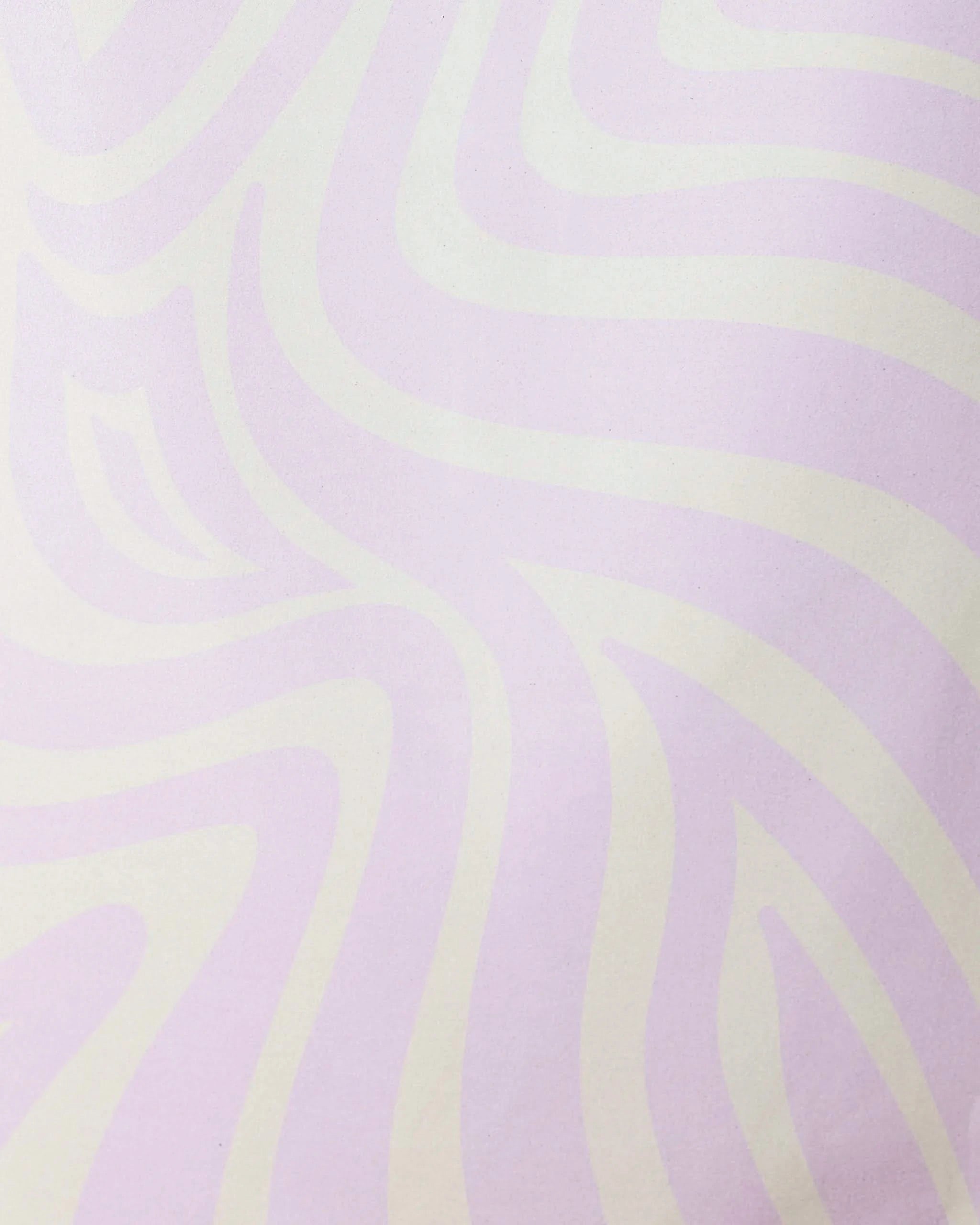 Abstract image with wavy, flowing lines in light lavender and off-white creates a soft zebra-like pattern, evoking the smooth design of GEOMETRY’s Dizzy Lilac Micro-loop Beach Towel. Gentle curves blend seamlessly across the surface.