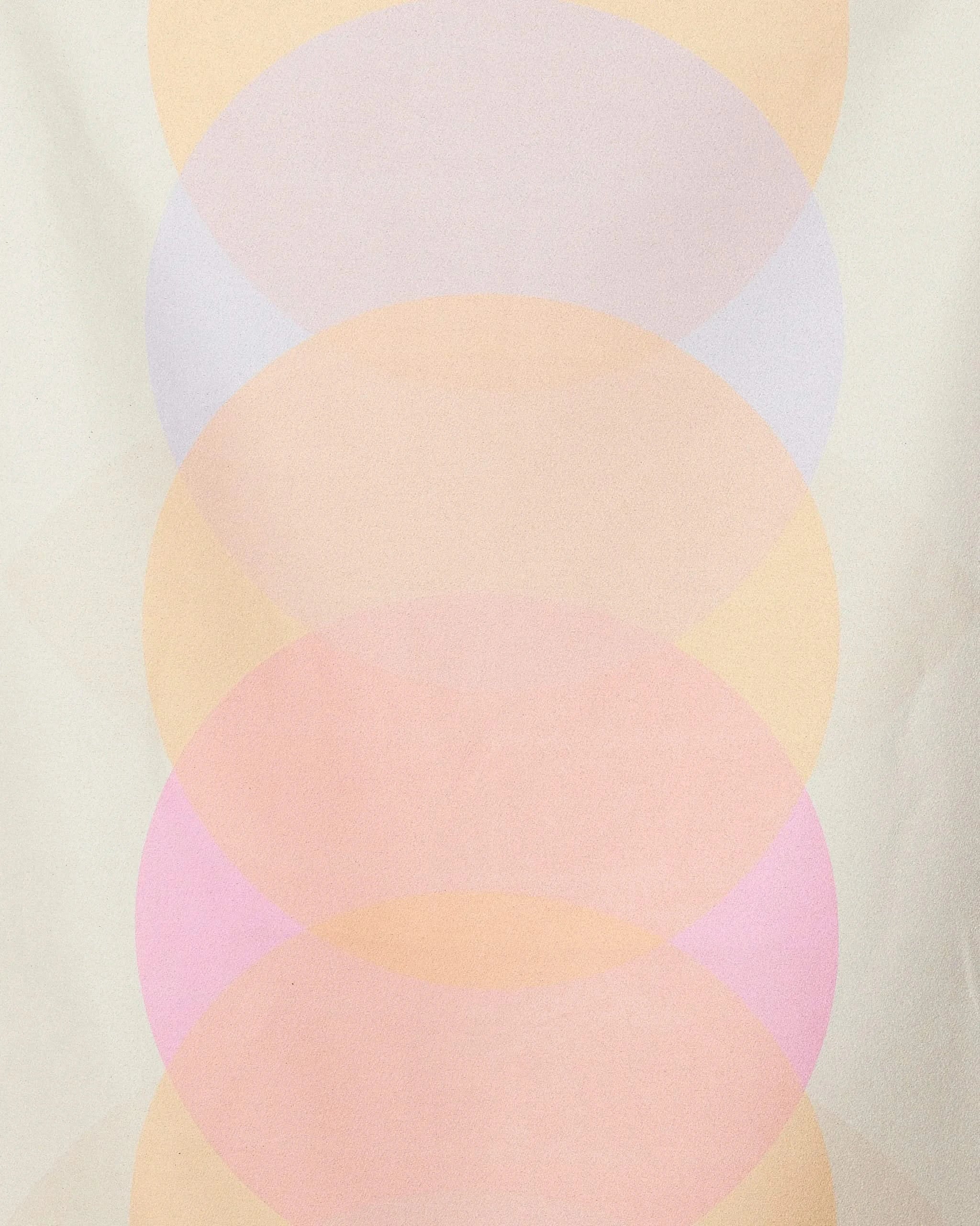 The Funky Phases beach towel by GEOMETRY features a soft geometric pattern of overlapping translucent circles in pastel hues and offers quick-drying performance.