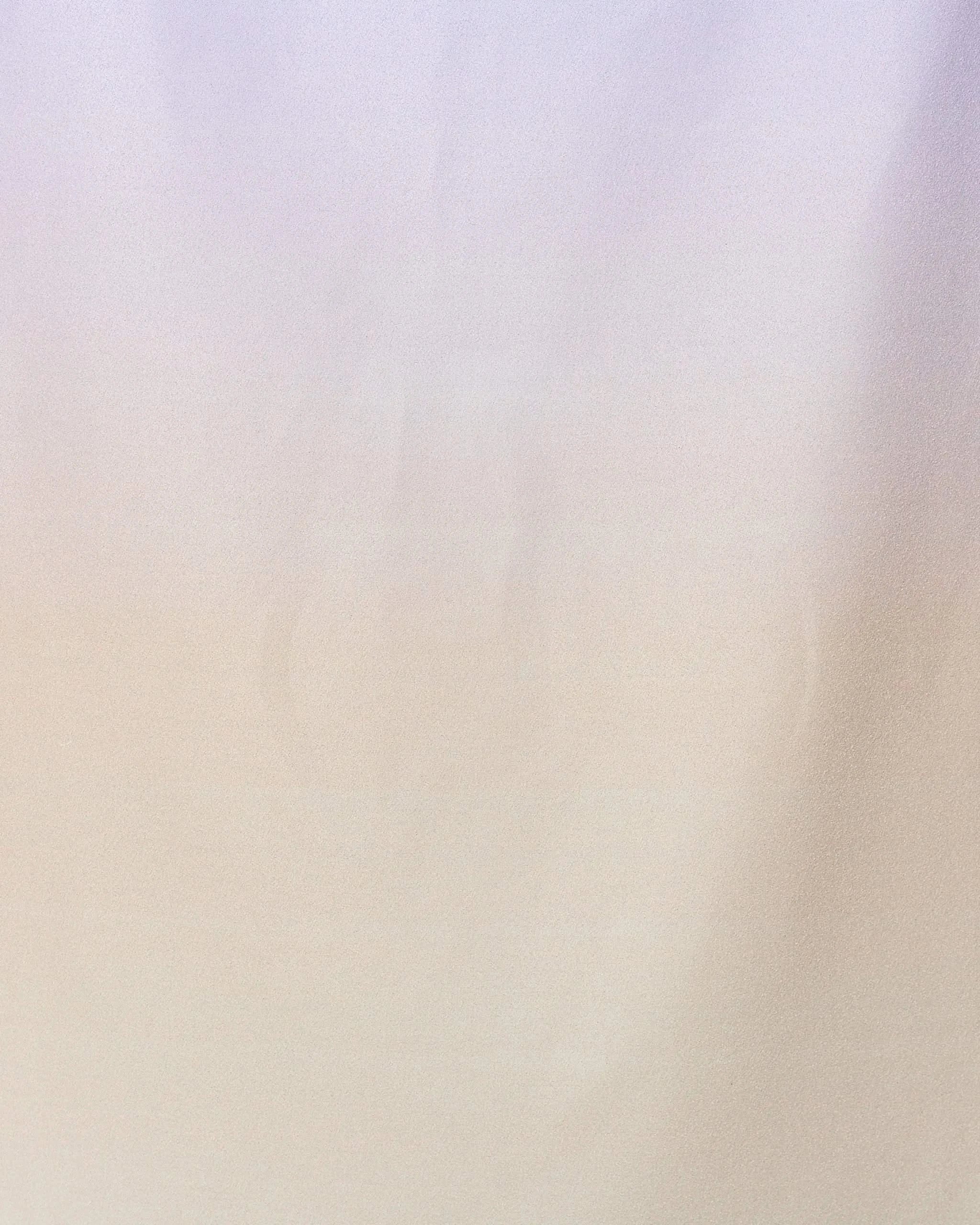 A soft, smooth fabric background with a subtle gradient of light beige and lavender, inspired by the calming look of GEOMETRYs Groovy Gradient Beach Towel made from recycled materials for a minimalist touch.