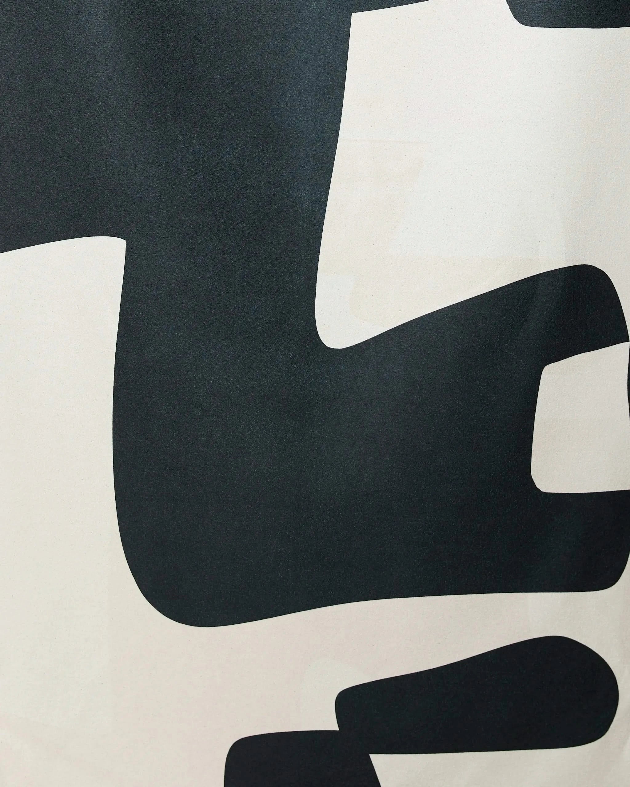Abstract Neutral by GEOMETRY features a modern minimalist design of large, smooth-edged black and white shapes on a light background—ideal for the Geometry Micro-loop Beach Towel.