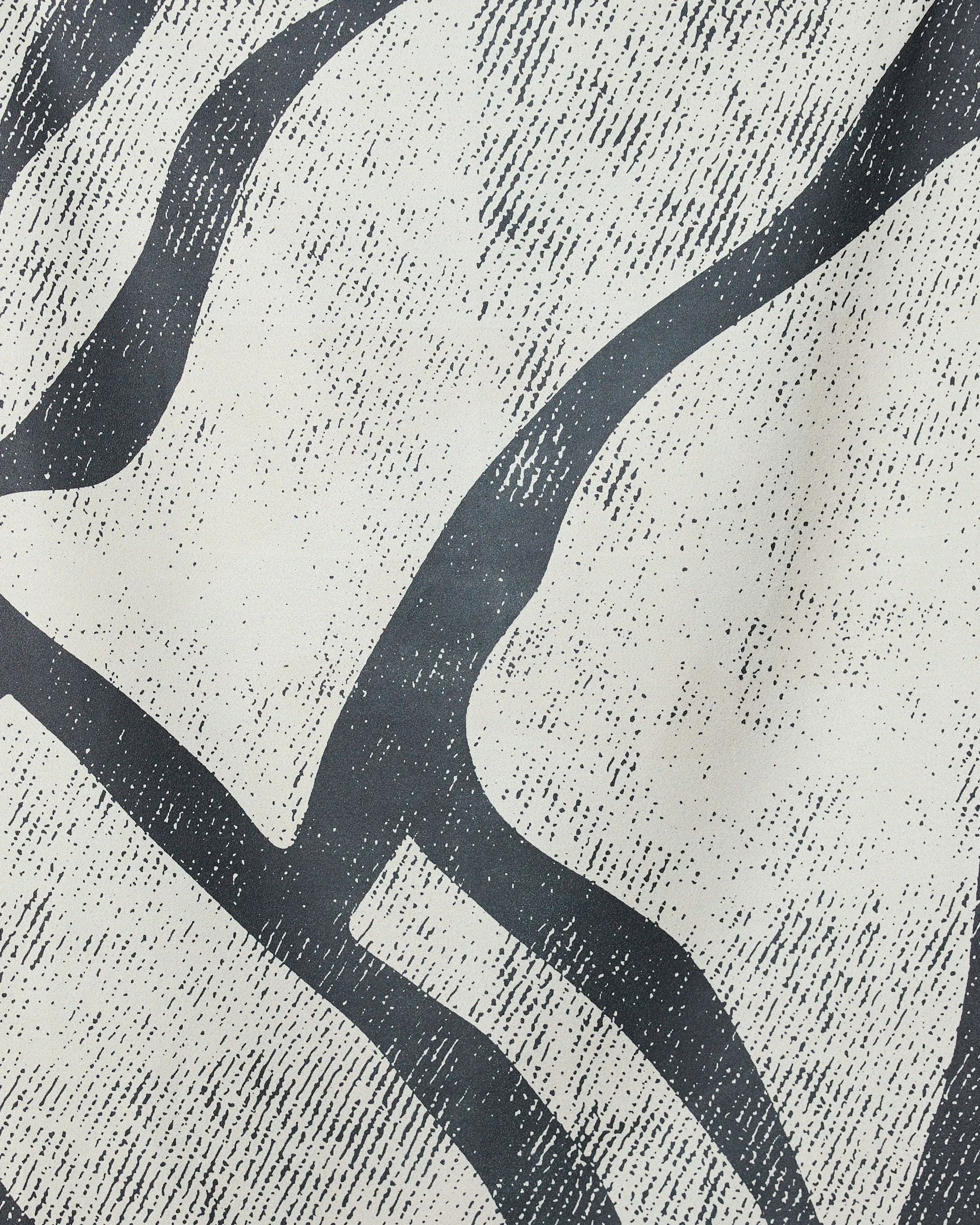 Abstract black wavy lines and dotted textures flow across an off-white background, inspired by the organic patterns of the GEOMETRY Block Beach Towel made from recycled materials.