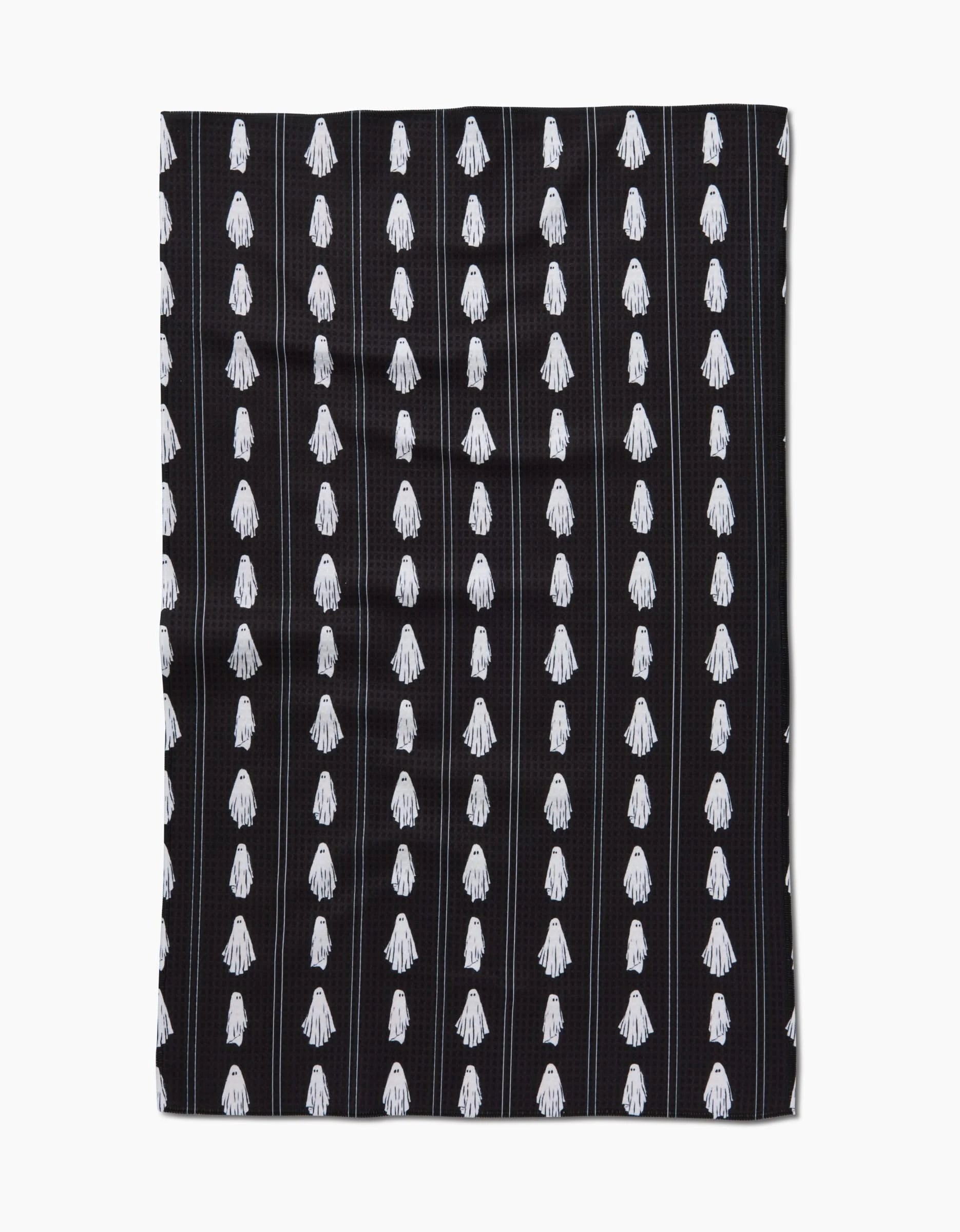 The Aubrey Fairchild Ghost Pinstripes hand towel features vertical rows of evenly spaced white hand motifs on black fabric, arranged in a repeating top-to-bottom pattern.