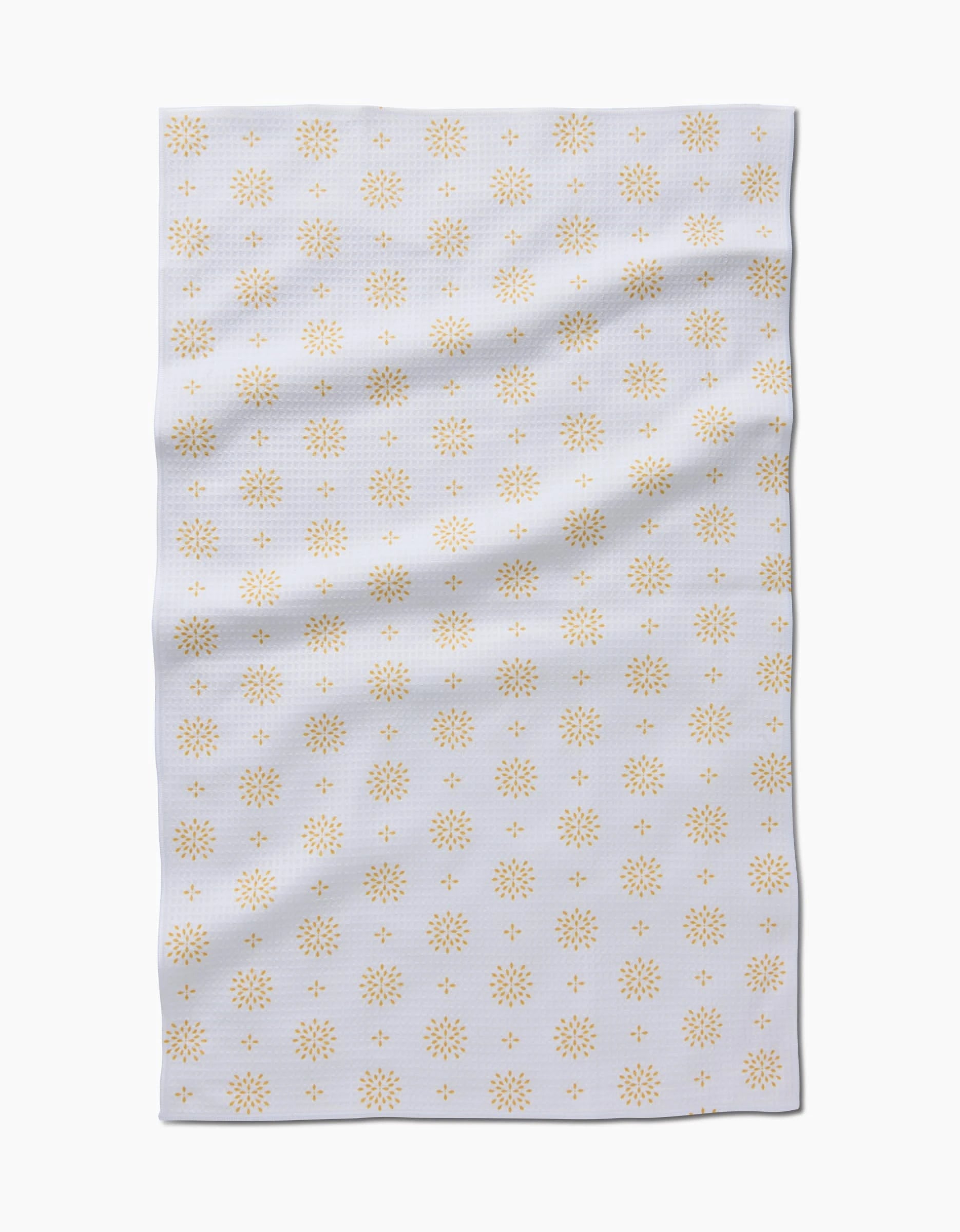 The Morning Petals Luxe Hand Towel by Danelys Sidron features a white rectangular Geoweave cloth, slightly wrinkled, with a repeating pattern of small yellow starburst-like designs for an ultra-absorbent, stylish touch.