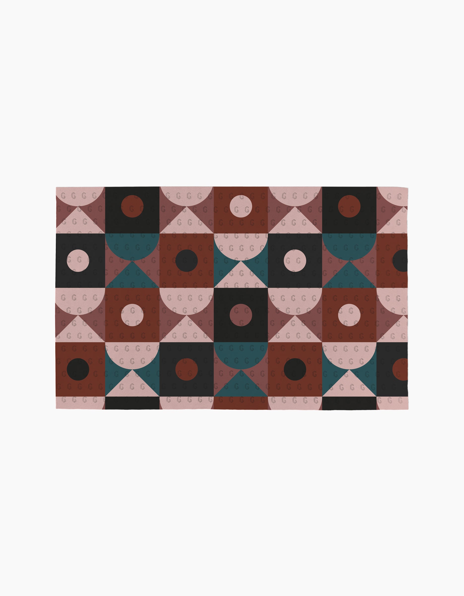 The Abstract Retro rug by Jennifer Bouron features a geometric pattern of circles, triangles, and semicircles in brown, pink, black, and teal, arranged in a grid on a white background, inspired by reusable paper towels.
