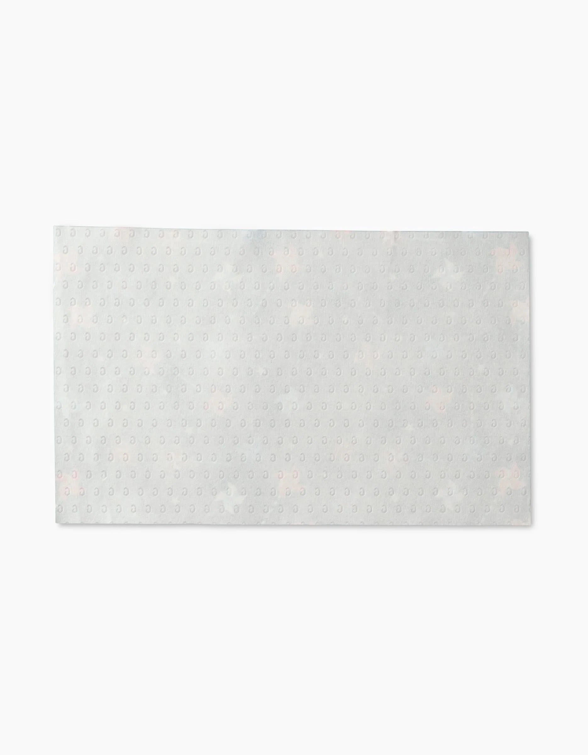 The Mindfulnice Seeing Stars sheet is rectangular, light gray with a dotted design and pale pink accents, made from eco-friendly post-consumer recycled materials, and is shown lying flat on a white background.