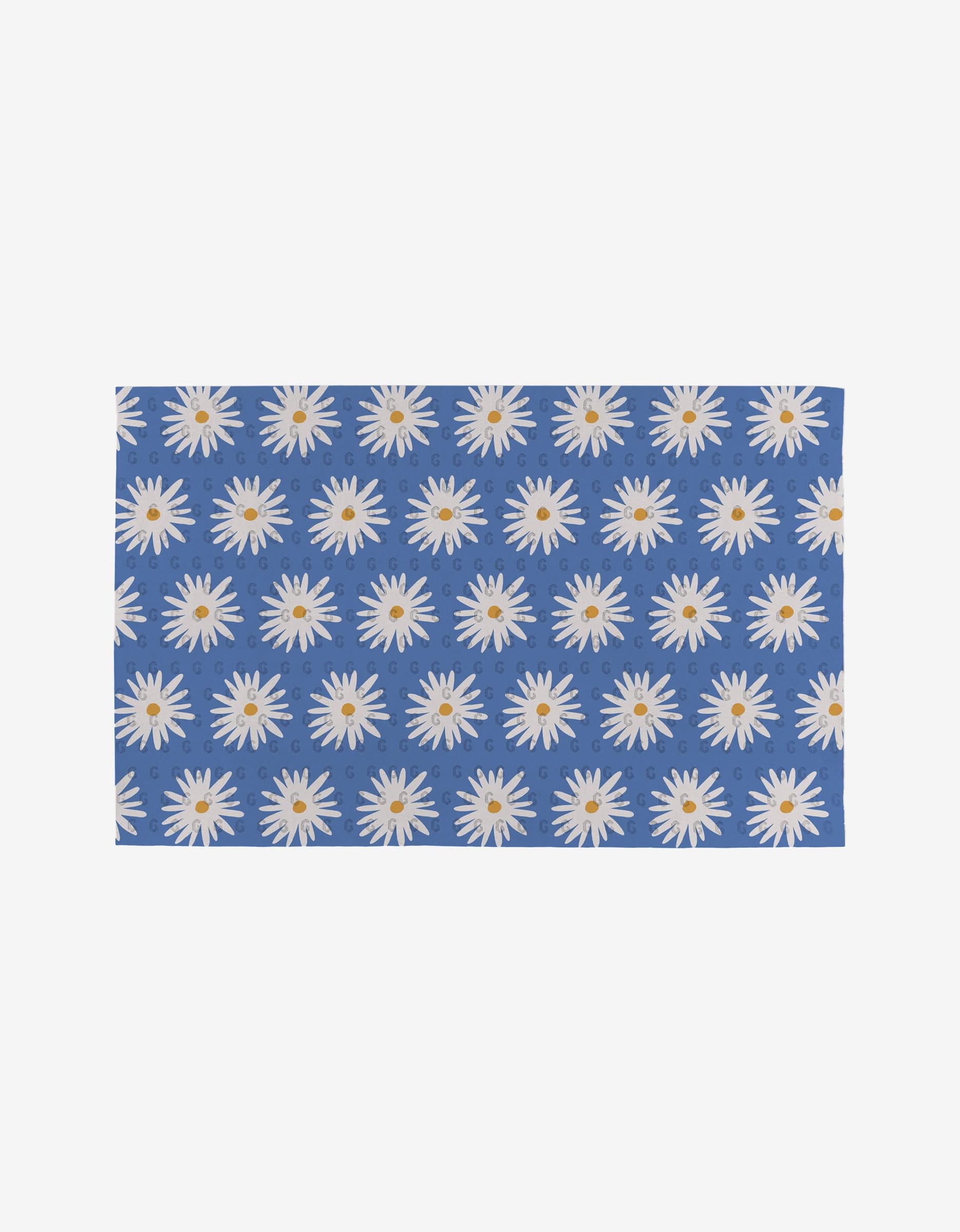 Megan Roy’s Blue Daisies is a rectangular blue mat with evenly spaced white daisies featuring yellow centers—a reusable, eco-friendly alternative to Not Paper Towels.