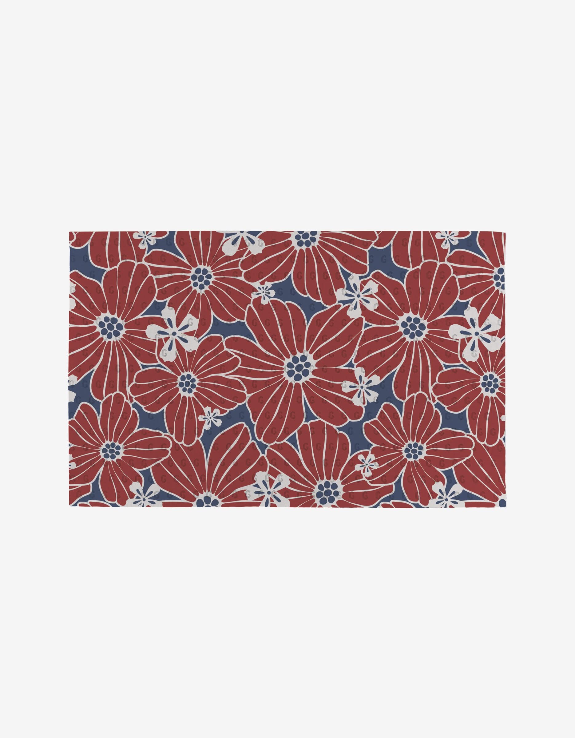 Botanical Blush by Ashley Celena features large red and small white flowers with blue centers on a dark blue background. This dense, white-outlined floral design is made from eco-friendly, recyclable materials—not paper towels.