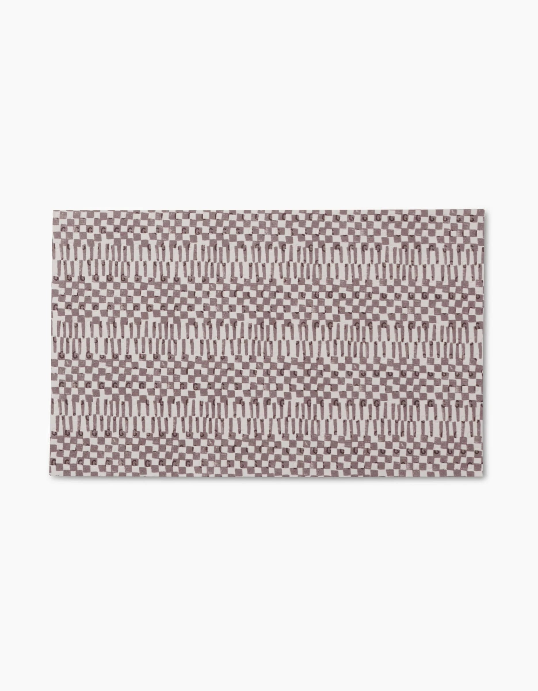 Chutes Coffee by Studio Jeannot is a rectangular rug with a geometric brown and beige pattern of repeating rectangles and ovals on white, crafted from recycled materials for an eco-friendly touch.