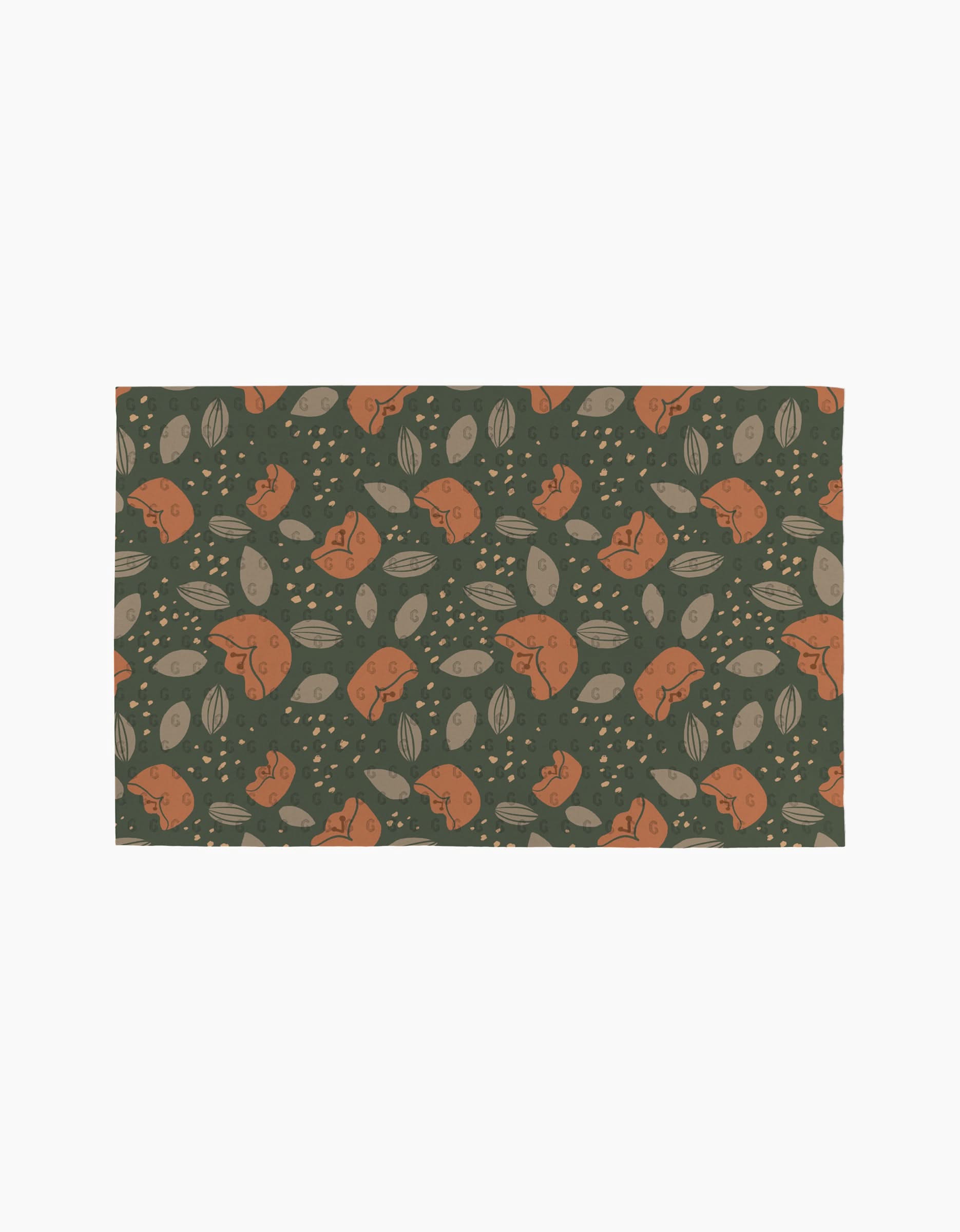 The Cali Sun mat by Amberleigh Adoff features orange rabbits, beige leaves, and dots on a dark green background for an eco-friendly touch inspired by reusable paper towels.