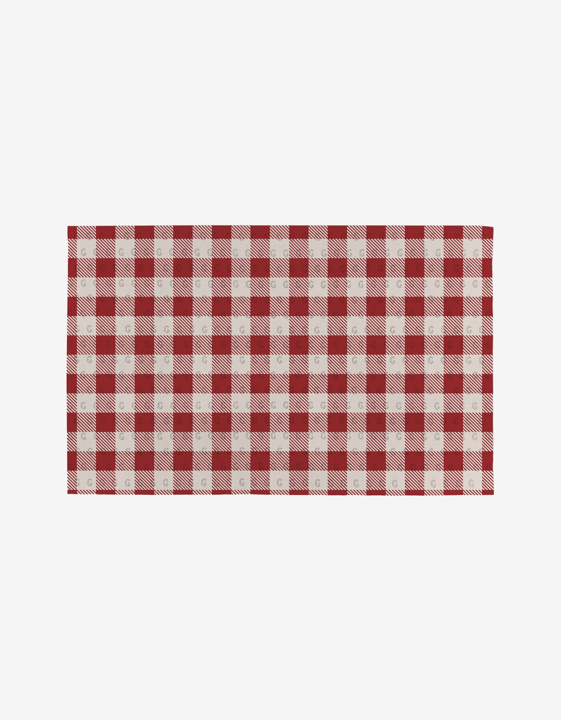Christmas Santa placemat by Aubrey Fairchild, featuring a festive red and white checkered gingham pattern, adds eco-friendly charm to your holiday table while helping reduce waste. Displayed on a white background.