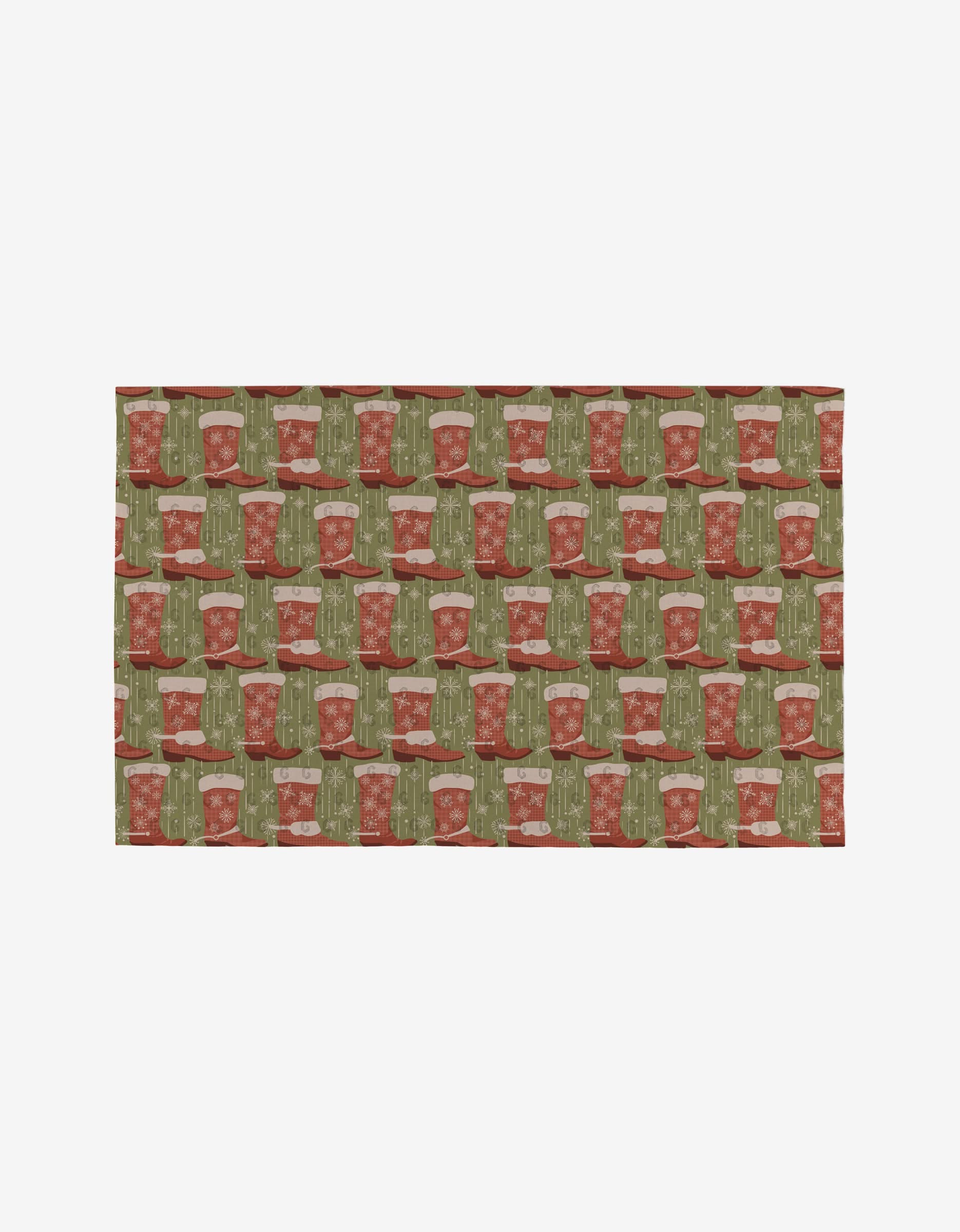 The Cowboy Winter mat by Julianne Haness is a rectangular, eco-friendly design featuring red and green Christmas mugs and cups with stars, snowflakes, reindeer, and trees on a white background.