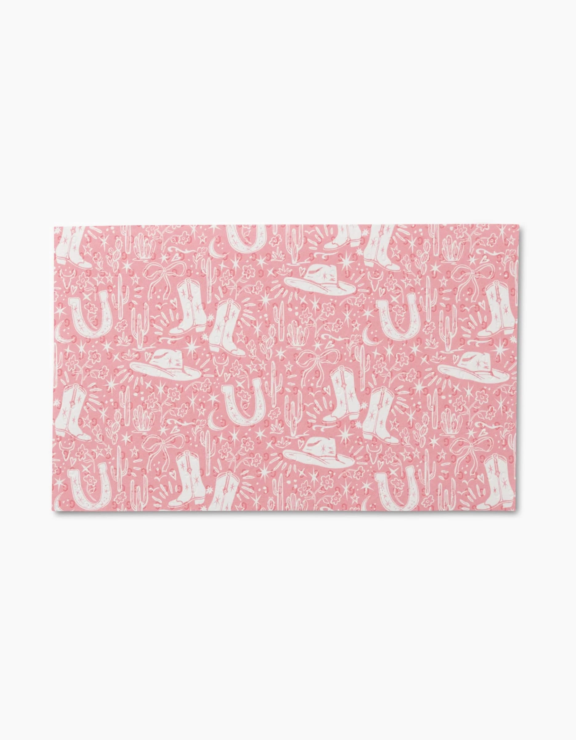 Cowgirl Chic by Aubrey Fairchild is a pink rectangular mat with a white Western print of boots, hats, horseshoes, cacti, and stars. Reusable and eco-friendly—an ideal Not Paper Towels alternative.