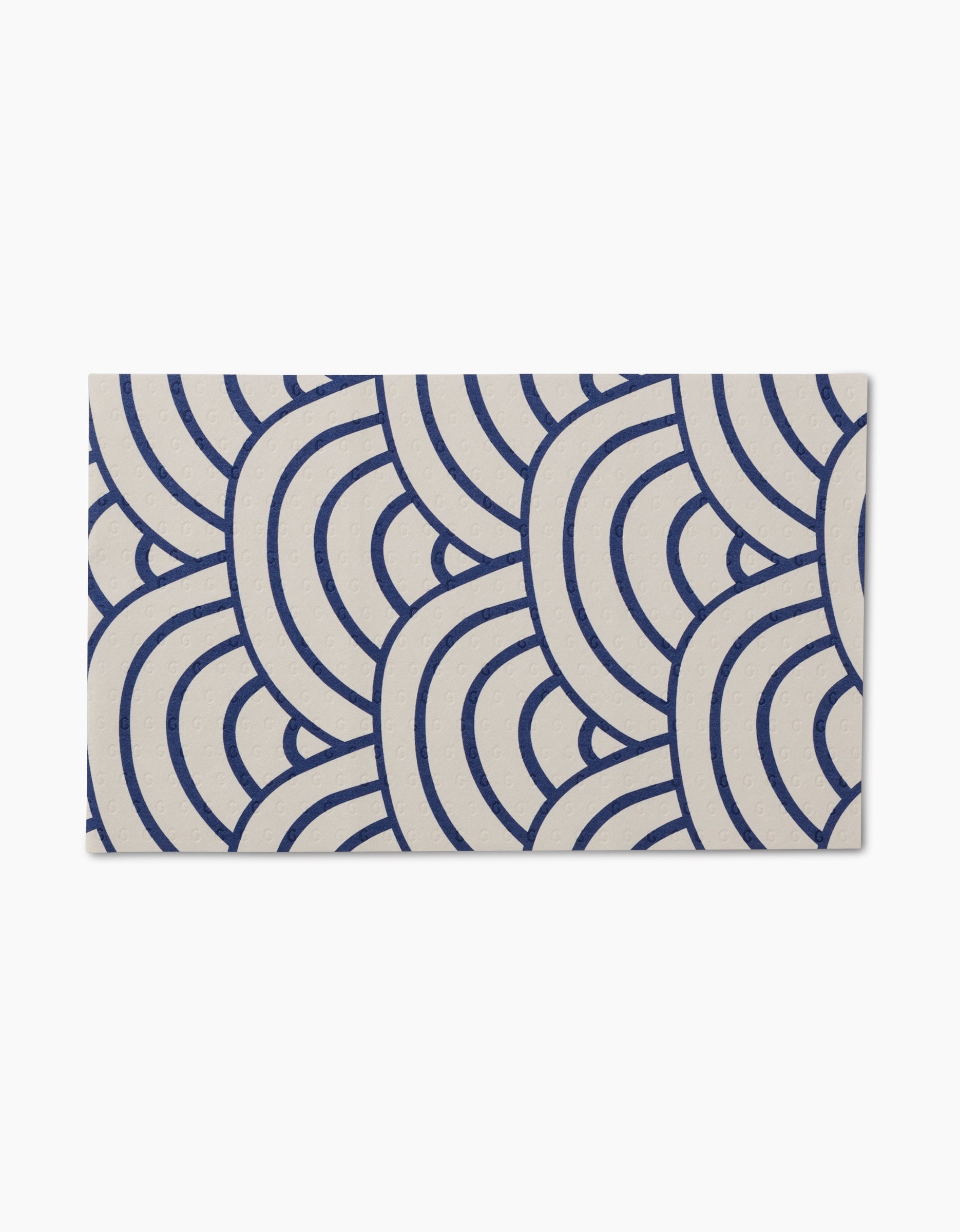 Every Wish by GEOMETRY is a reusable rectangular card featuring a navy blue overlapping scale pattern on cream—an eco-friendly alternative to paper towels.