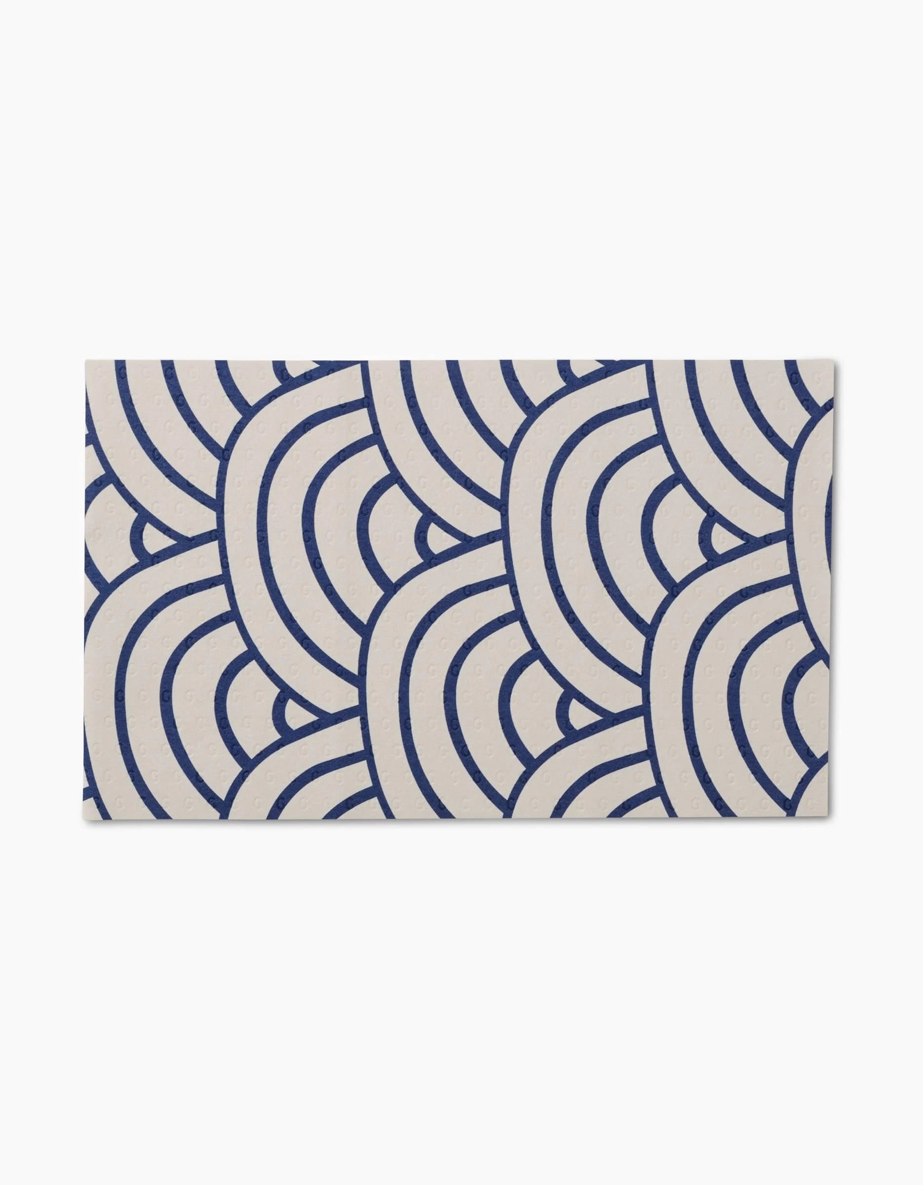 Every Wish by GEOMETRY is a reusable rectangular card featuring a navy blue overlapping scale pattern on cream—an eco-friendly alternative to paper towels.