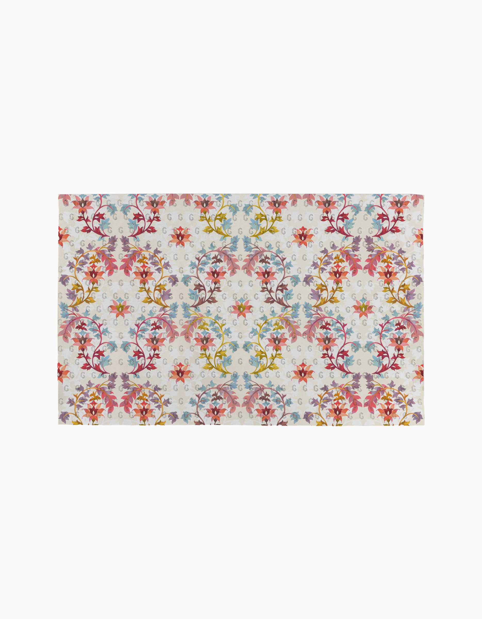 The Folk Medallion rug by Maayan Alper-Swan features a colorful floral and vine pattern in red, yellow, blue, and purple on white. Its symmetrical design adds vibrant charm—ideal for eco-friendly homes seeking striking décor.