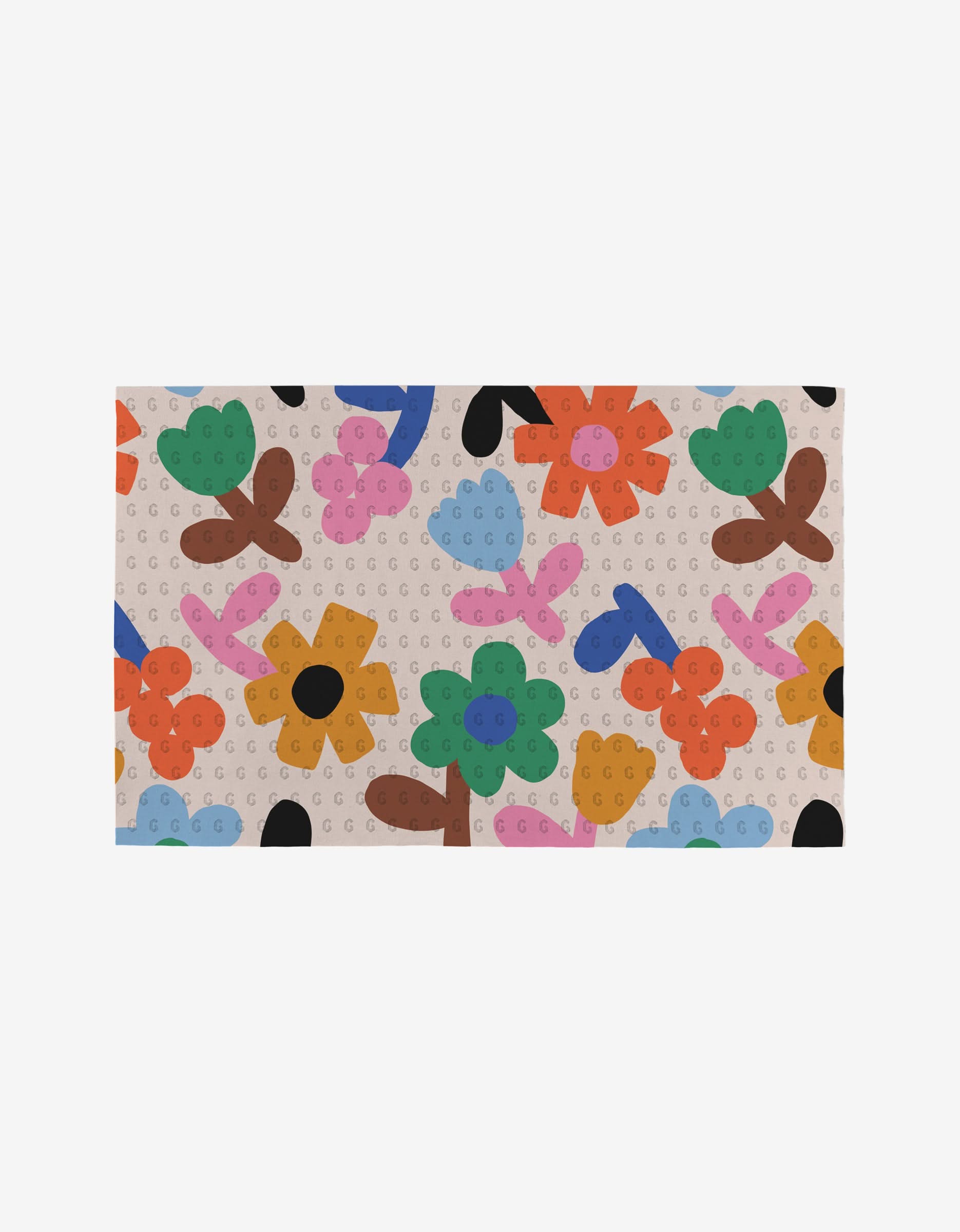The Fruit Basket rug by Jennifer Bouron is a rectangular, reusable accent featuring playful abstract flowers and leaves in orange, green, pink, blue, black, and brown on a light beige dotted background.