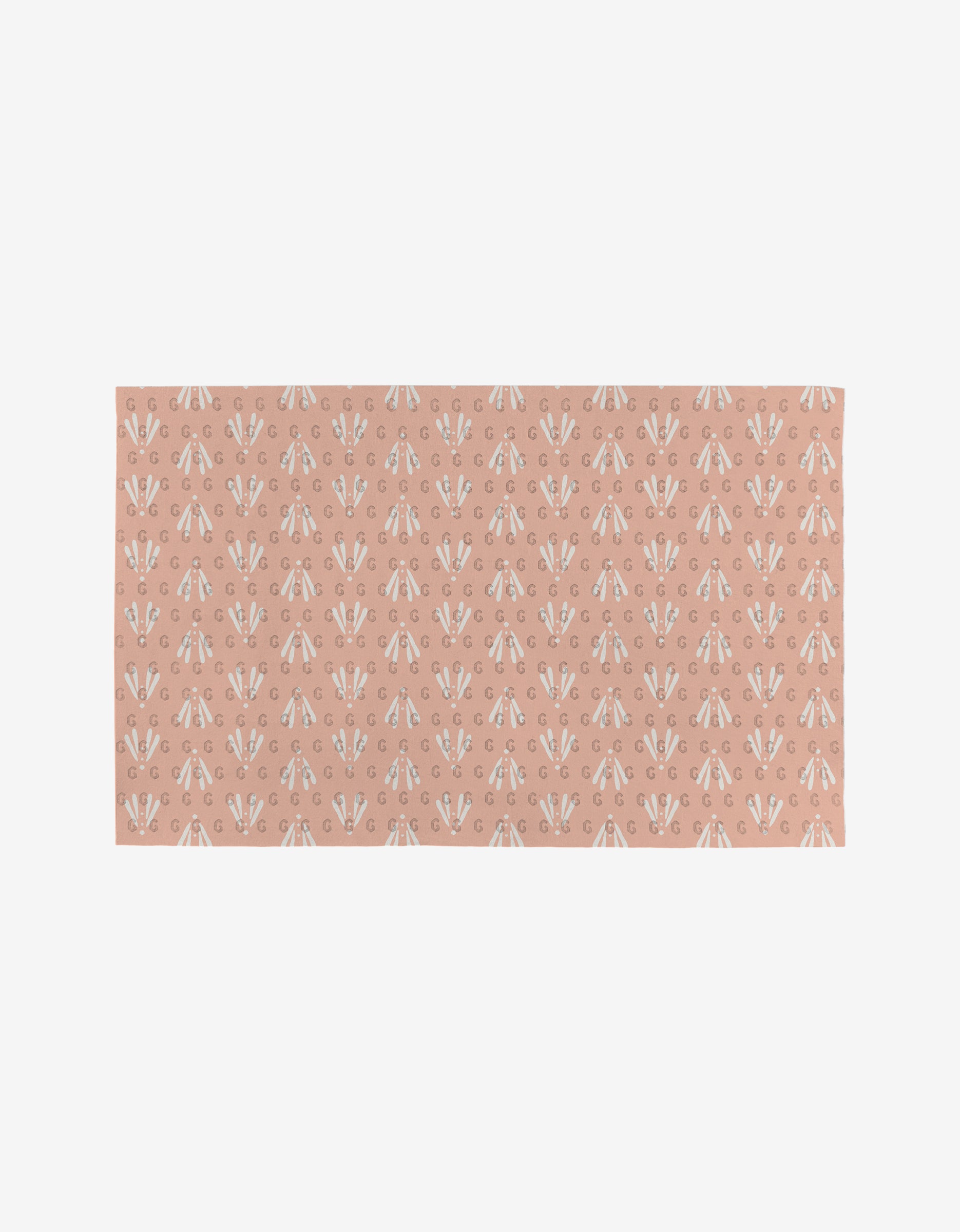 The Hufton Studio Garden Bloom rug features a muted pink background with evenly spaced white and beige floral motifs, crafted from eco-friendly materials.