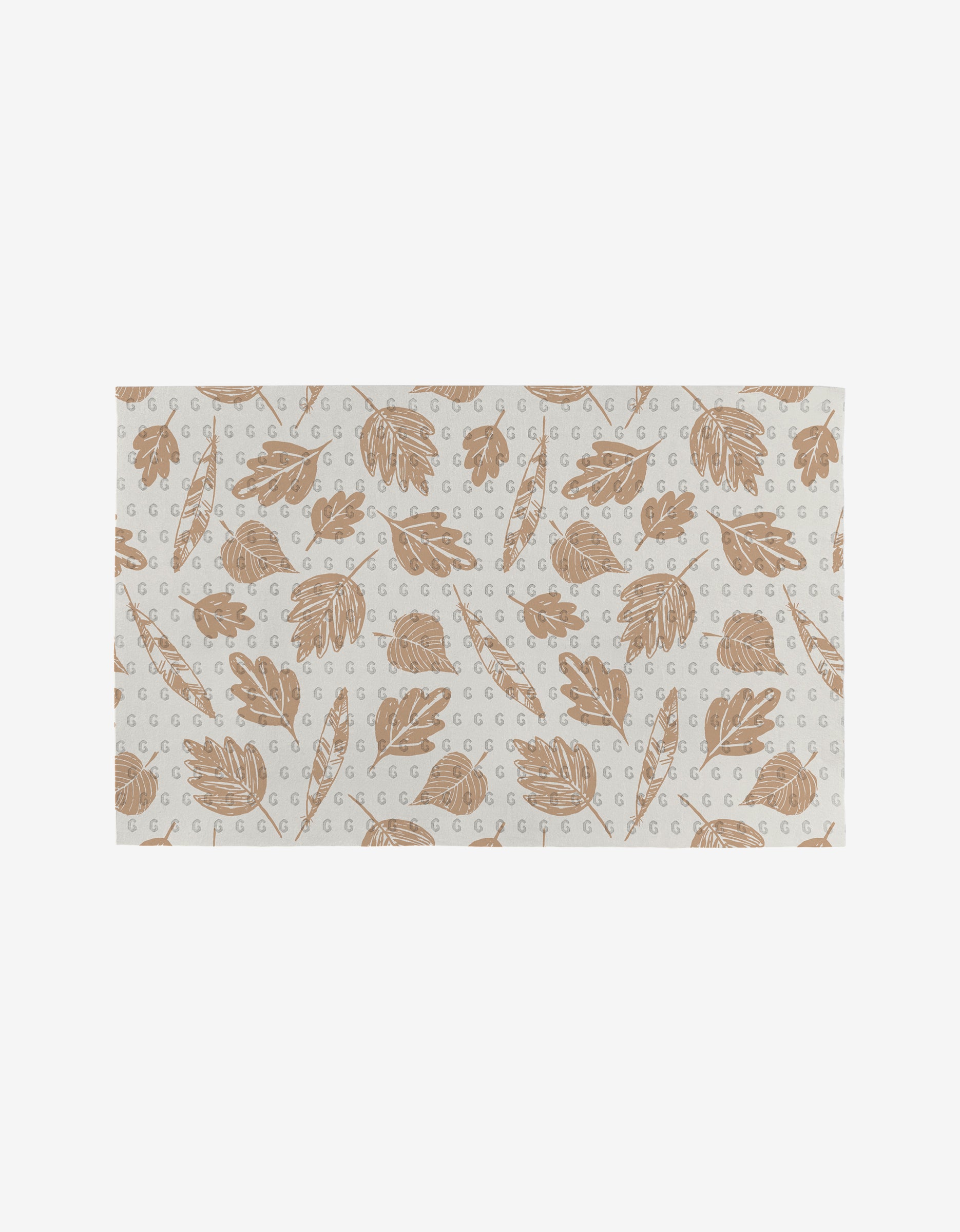 Garden Bloom by Hufton Studio is a rectangular mat featuring a repeating pattern of light brown leaves and branches on white, accented with small gray G letters. Made from post-consumer recycled materials.