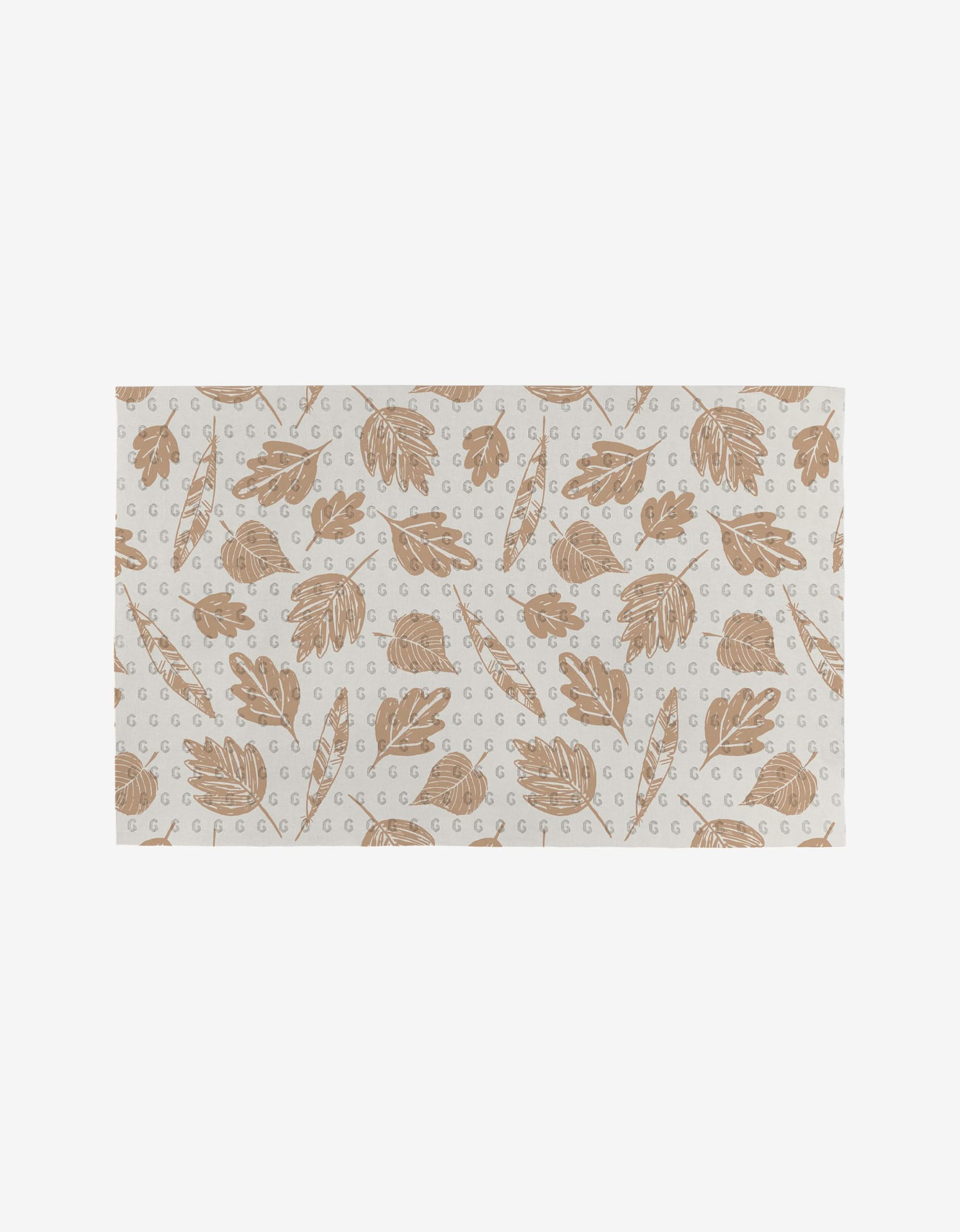 Garden Bloom by Hufton Studio is a rectangular mat featuring a repeating pattern of light brown leaves and branches on white, accented with small gray G letters. Made from post-consumer recycled materials.