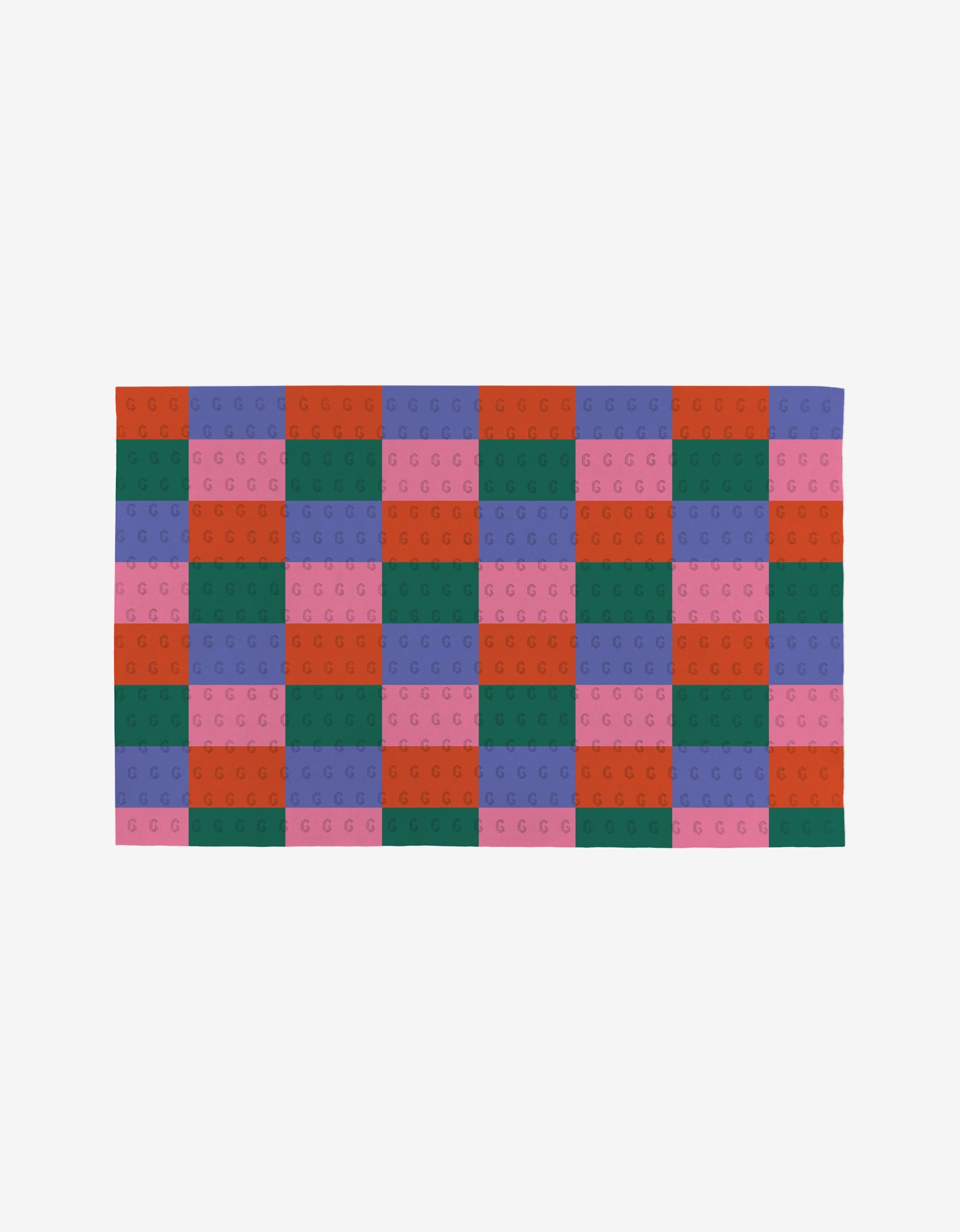 Holiday Patchwork by Laura Supnik is a rectangular item featuring a checkered pattern of red, green, blue, and pink squares on white, inspired by interlocking toy bricks and made from eco-friendly recycled materials.