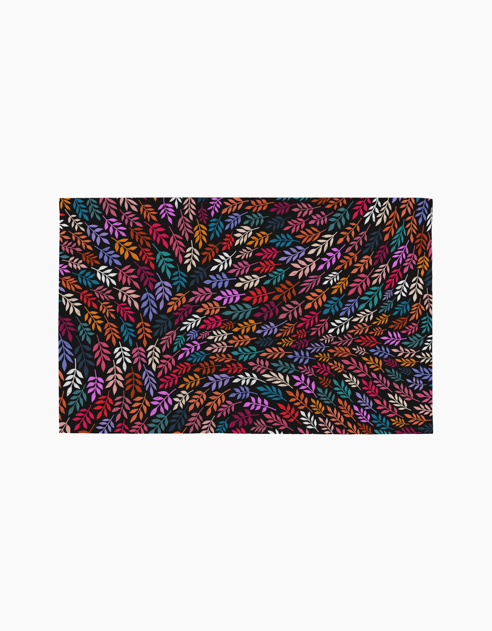 Jewel Leaf Swirl by Rachel Parker showcases densely packed, colorful leaf-like shapes in red, orange, purple, pink, and white on black, creating a swirling, vibrant pattern reminiscent of eco-friendly paper towels.