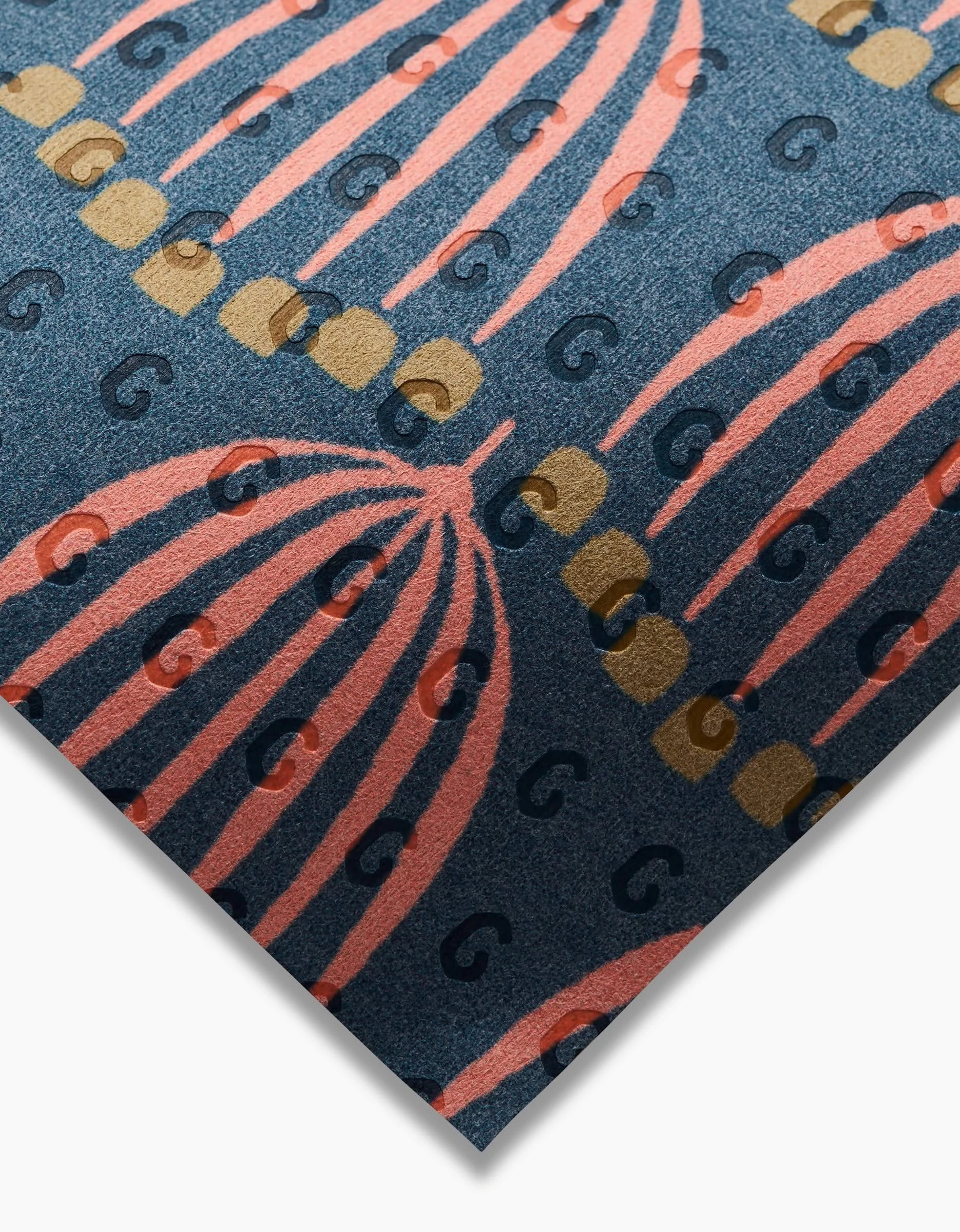 A close-up of Josie by Amy MacCready: patterned fabric with pink arcs, gold dots, and navy curved lines on blue, in a geometric repeat. An eco-friendly choice crafted from post-consumer recycled materials.