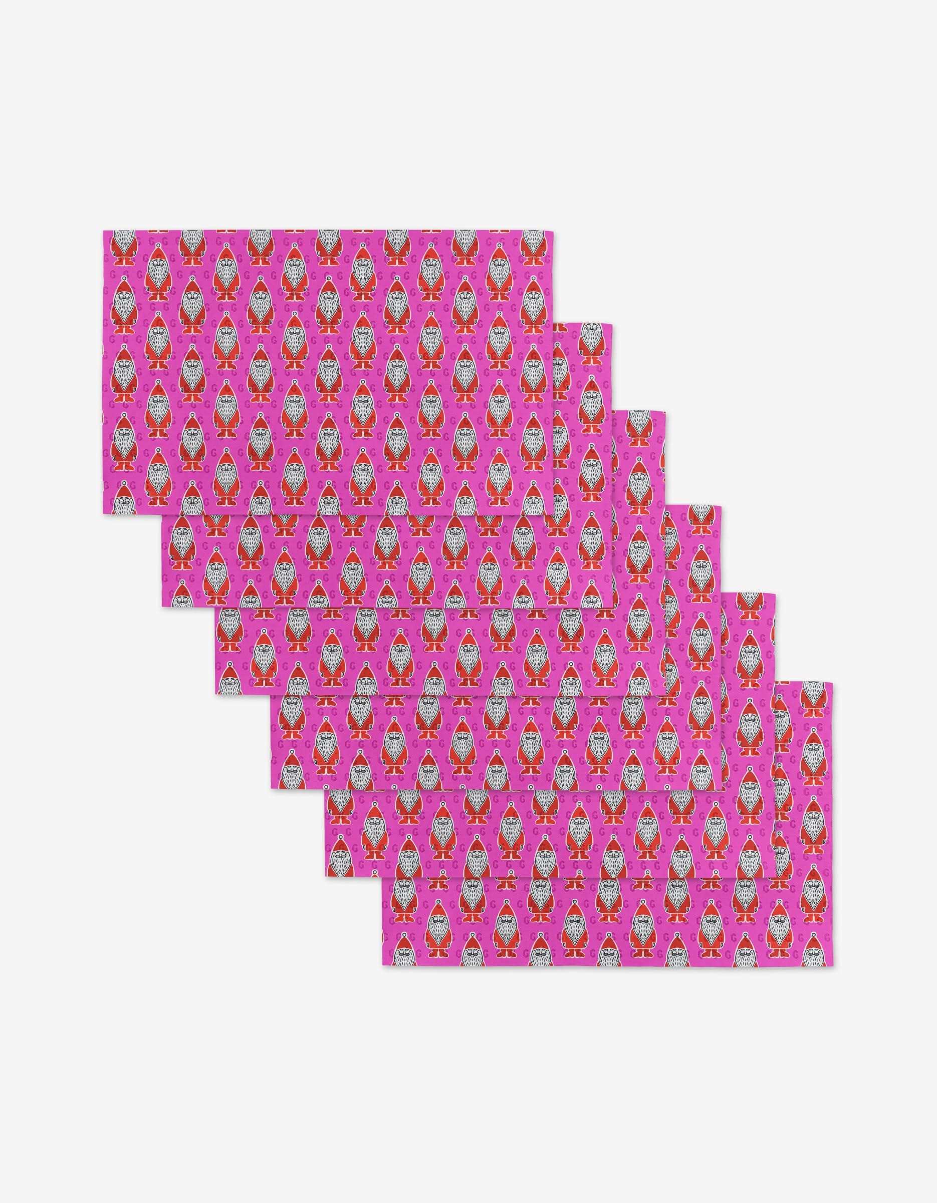 Six Klass rectangular sheets by Amy MacCready feature colorful cartoon female characters on a bright pink background, displayed staggered on white. They are an eco-friendly alternative to traditional paper towels.