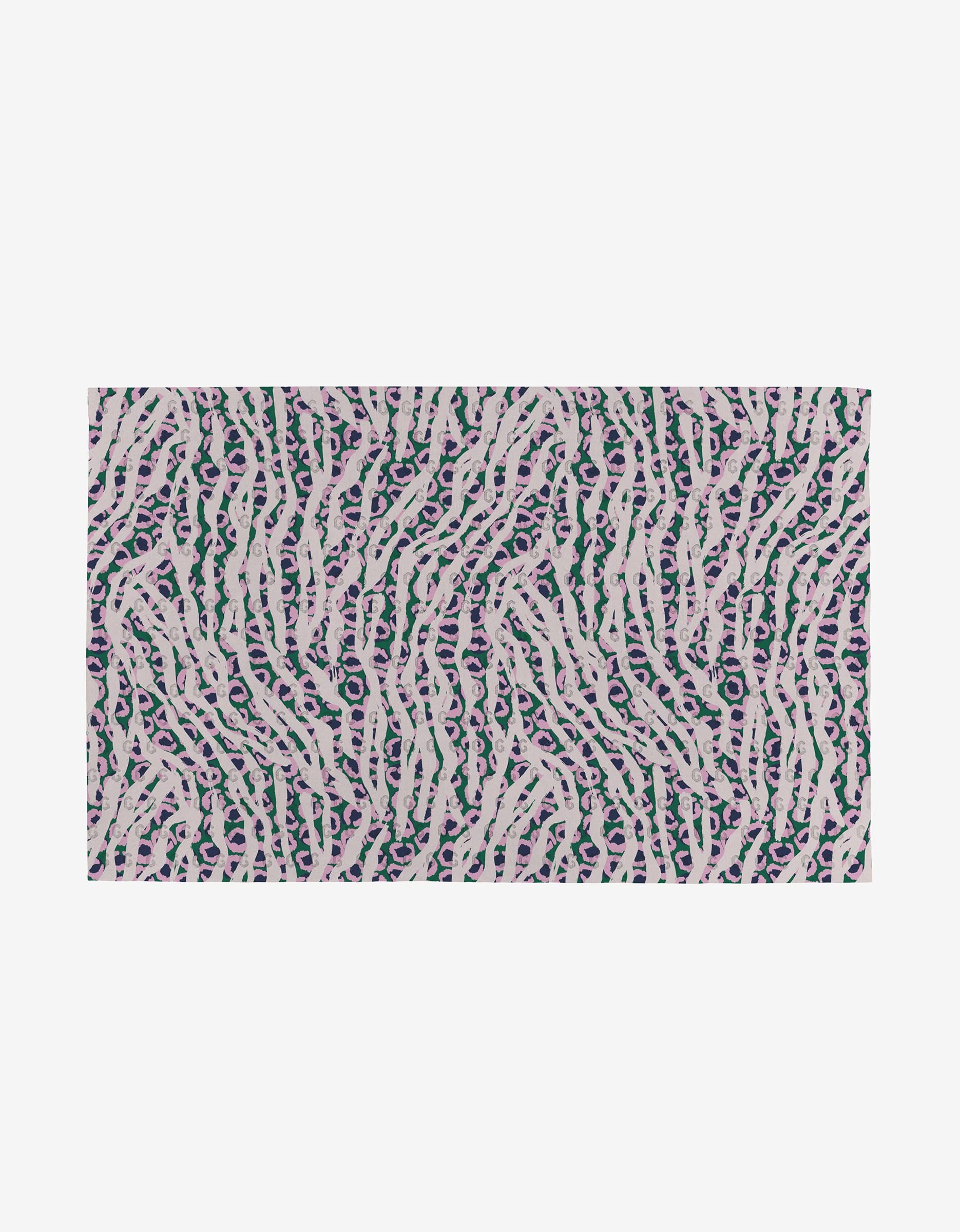 The Magic Field rug by Happy Hemera features an abstract design with wavy light beige lines on green and purple spots, evoking animal print and organic textures—crafted from post-consumer recycled materials for eco-friendliness.