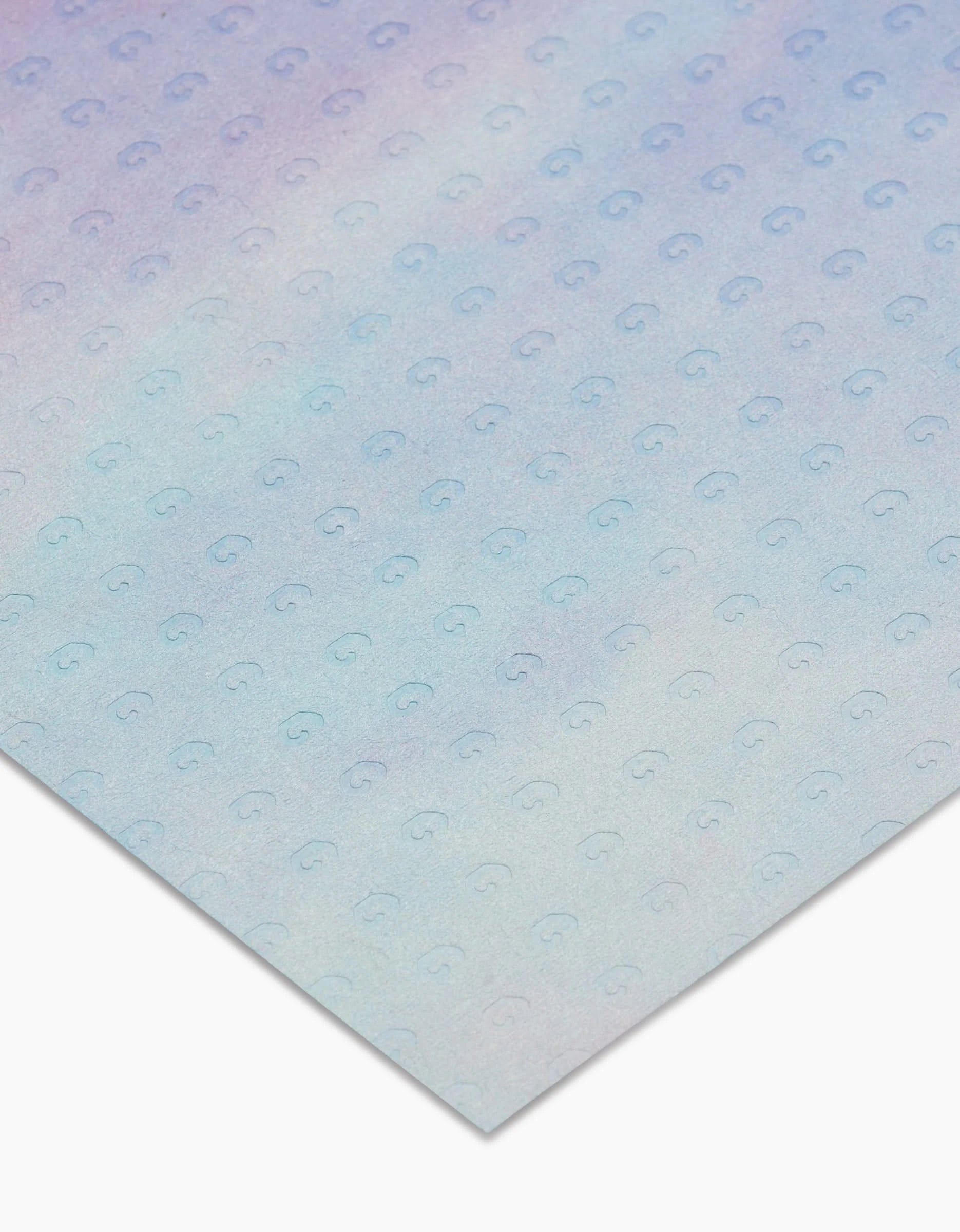 The Magic In The Sky pastel sheet by Stefanie Bales features a blue, pink, and purple gradient with a repeating light gray circular pattern on eco-friendly, post-consumer recycled paper, shown angled for effect.